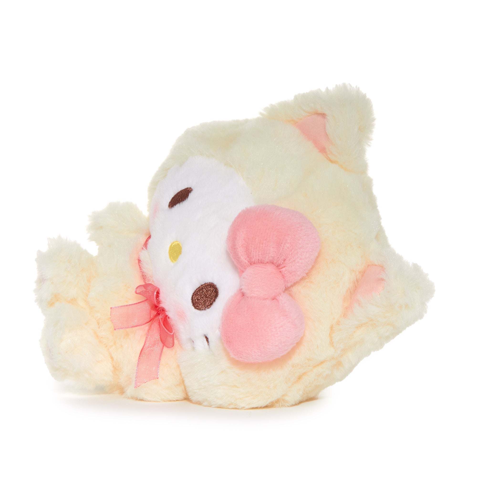 Close-up of the paw prints and embroidered details on the plush toy.