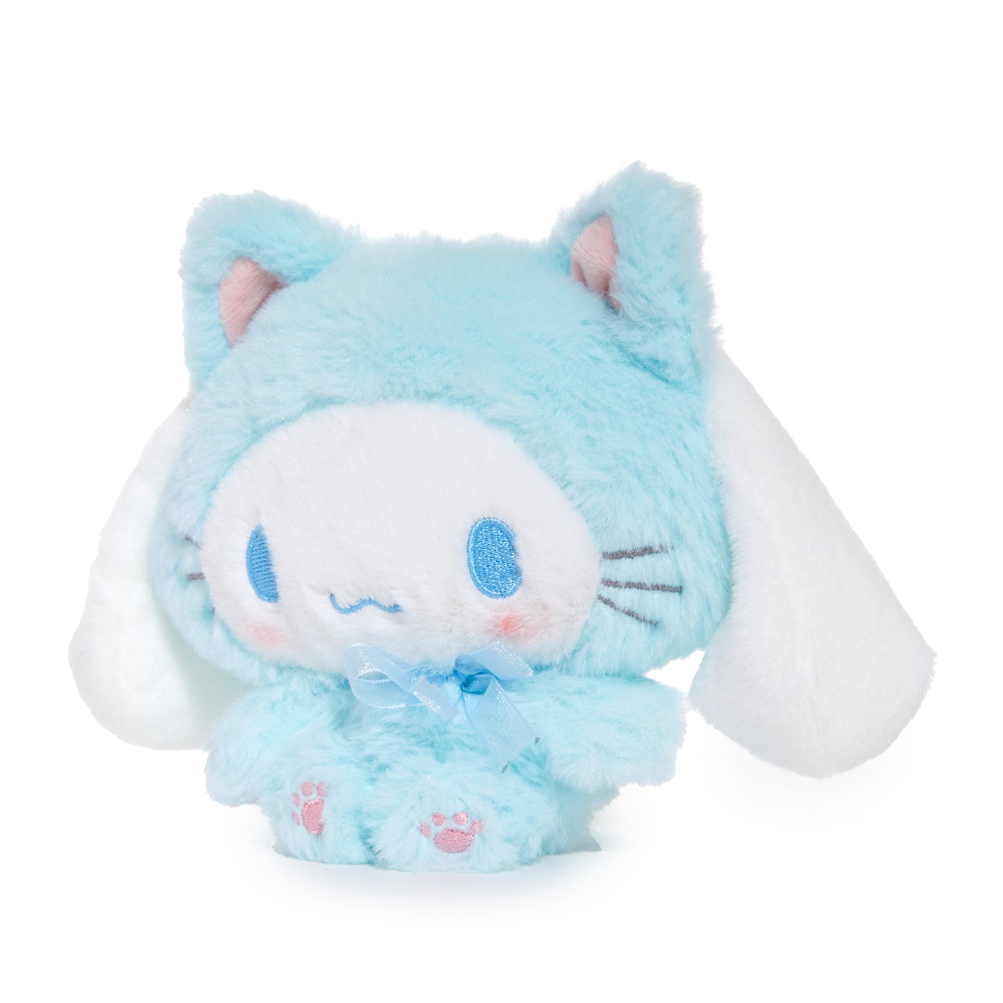 Close-up of Cinnamoroll kitten plush with pastel colors