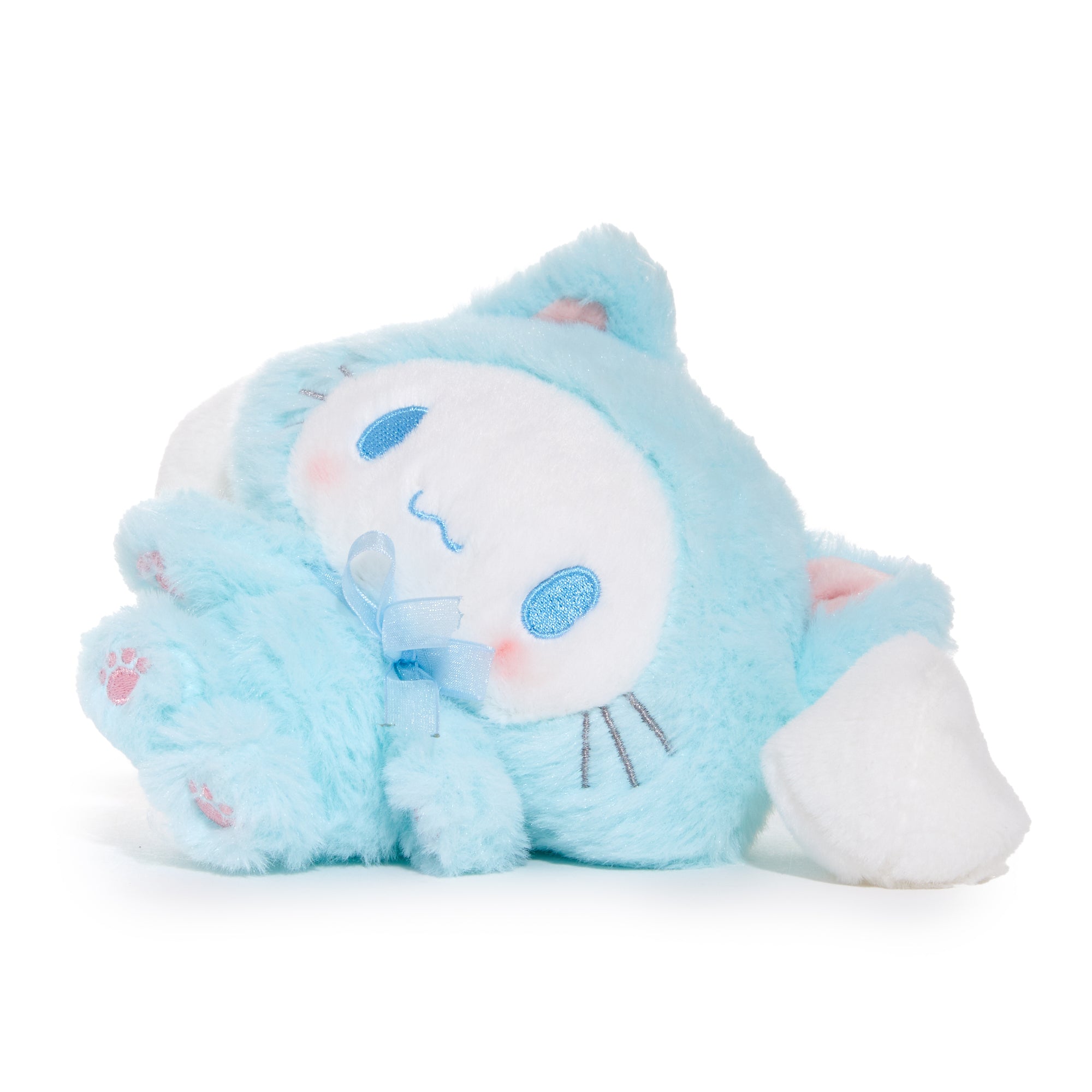Close-up of Cinnamoroll kitten plush with pastel colors