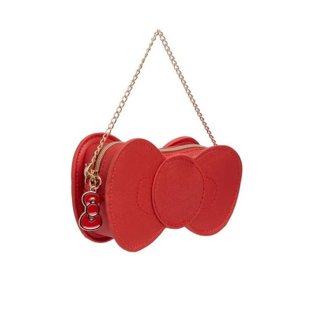 A close-up of the bow charm zipper pull on the Hello Kitty tote bag.