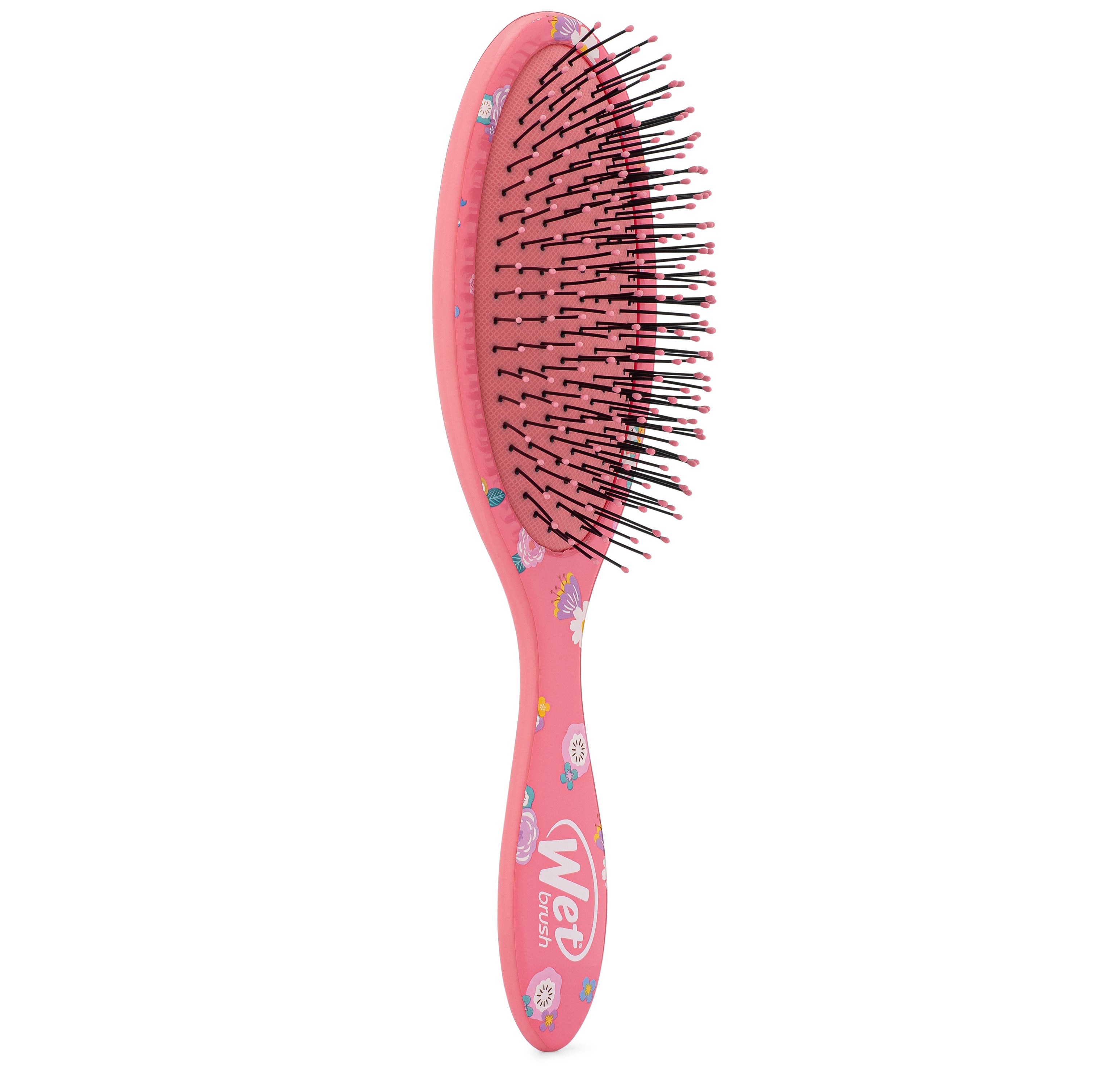 Hello Kitty floral detangler brush on a vanity, ideal for daily styling