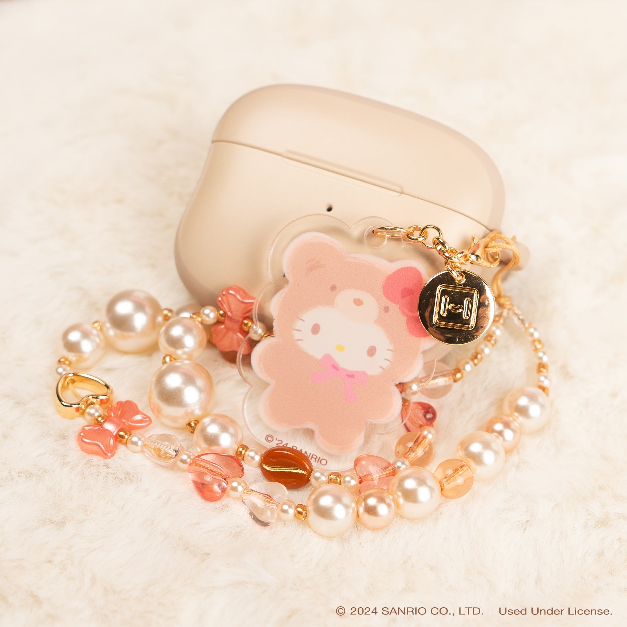 Hello Kitty Latte Bear phone strap with colorful beads and charms.