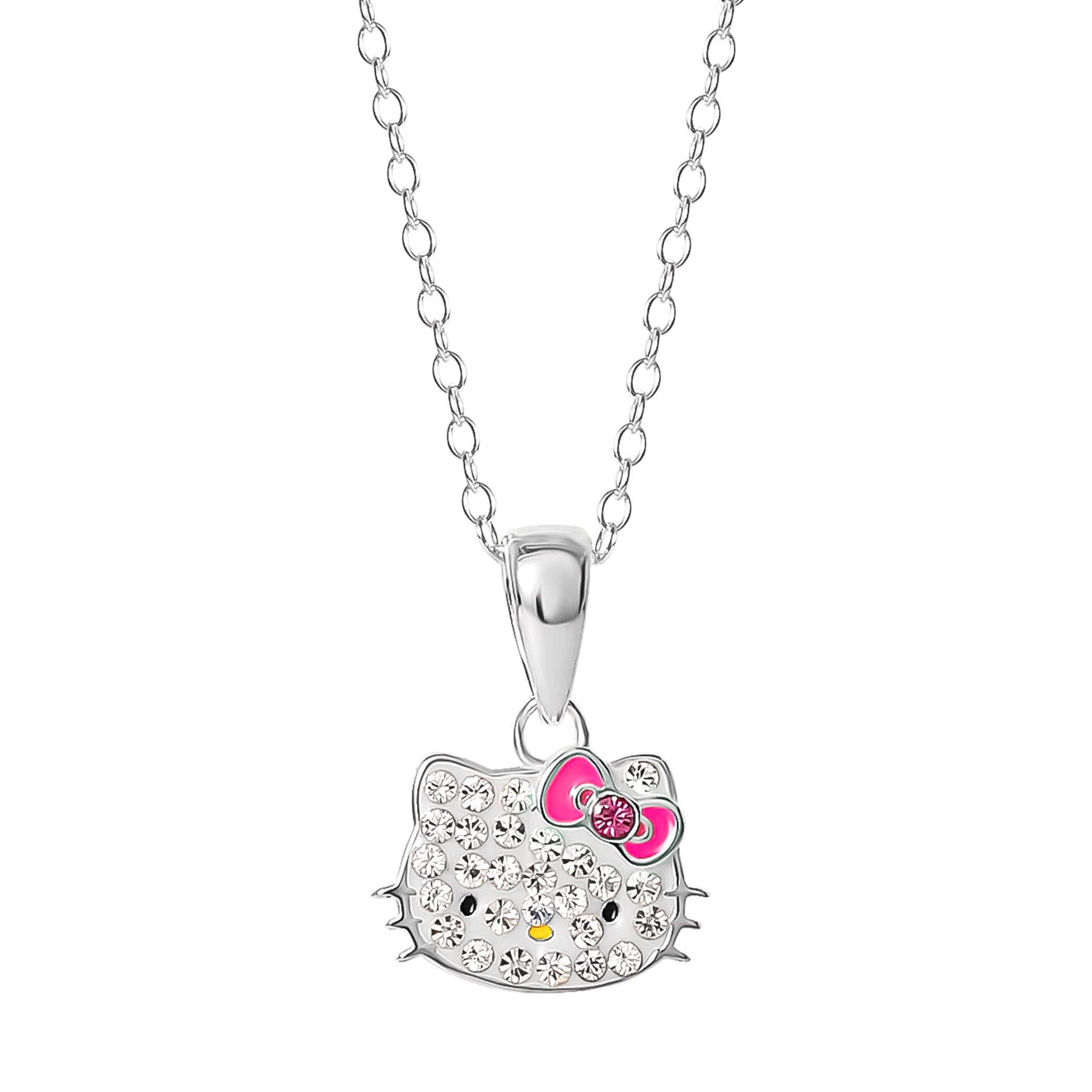 Close-up of Hello Kitty crystal pendant on sterling silver chain worn with casual outfit