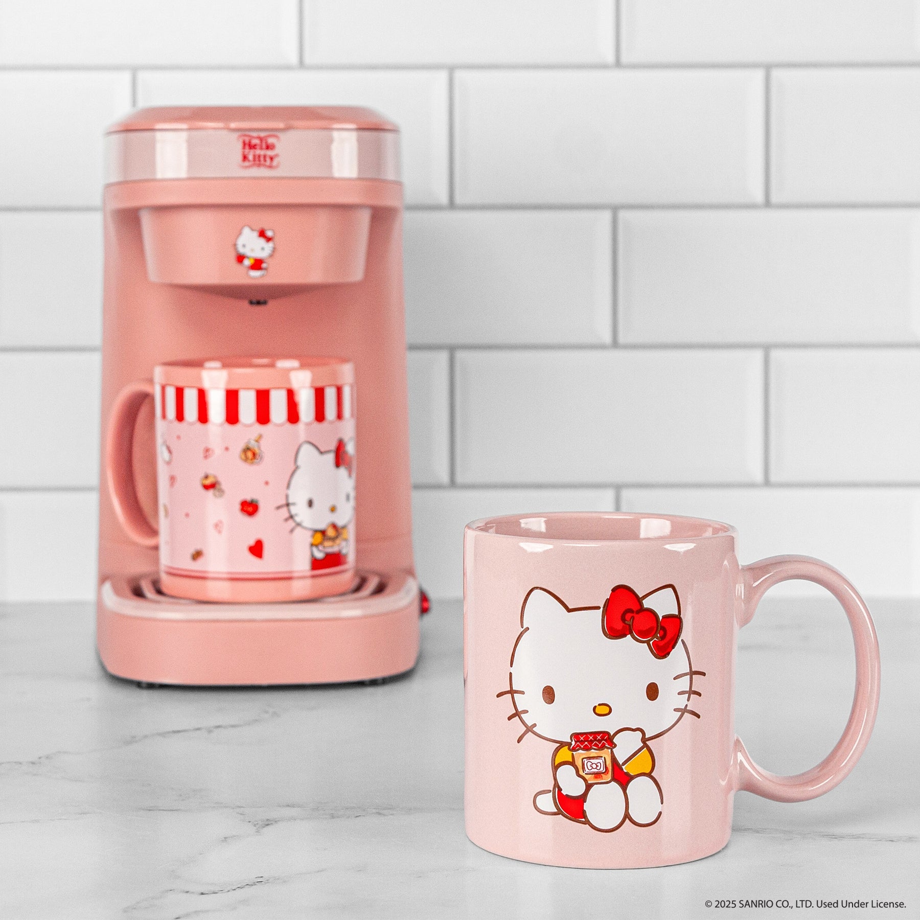 Hello Kitty single cup coffee maker on kitchen counter with morning light