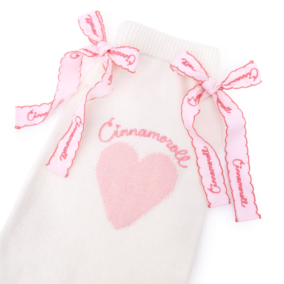 Close-up of the embroidered Cinnamoroll name on the leg warmers.