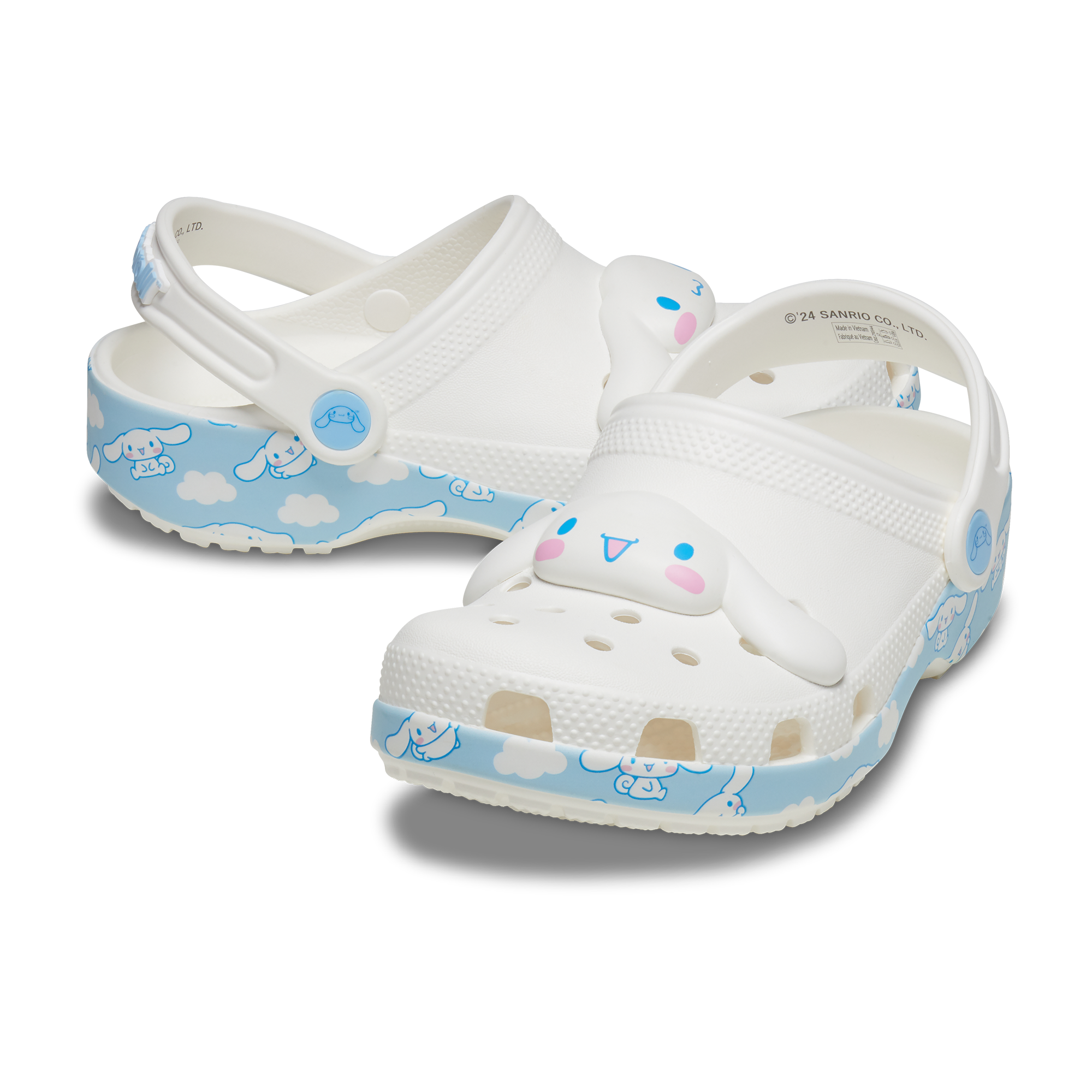Front view of kids clogs featuring cloud pattern and fixed Cinnamoroll charm.
