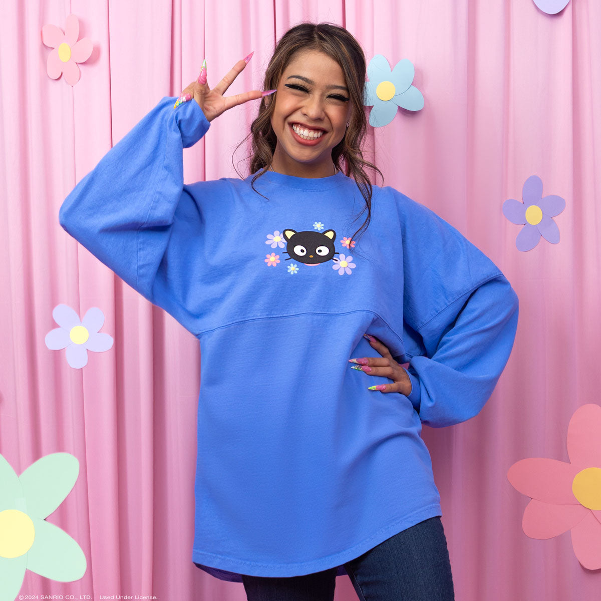Back of the jersey showing whimsical fish and vibrant text, a unique spirit jersey disney statement piece