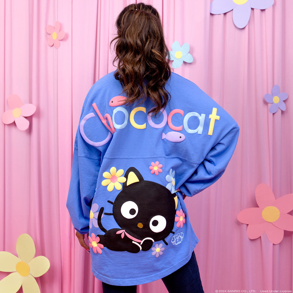 Back of the jersey showing whimsical fish and vibrant text, a unique spirit jersey disney statement piece