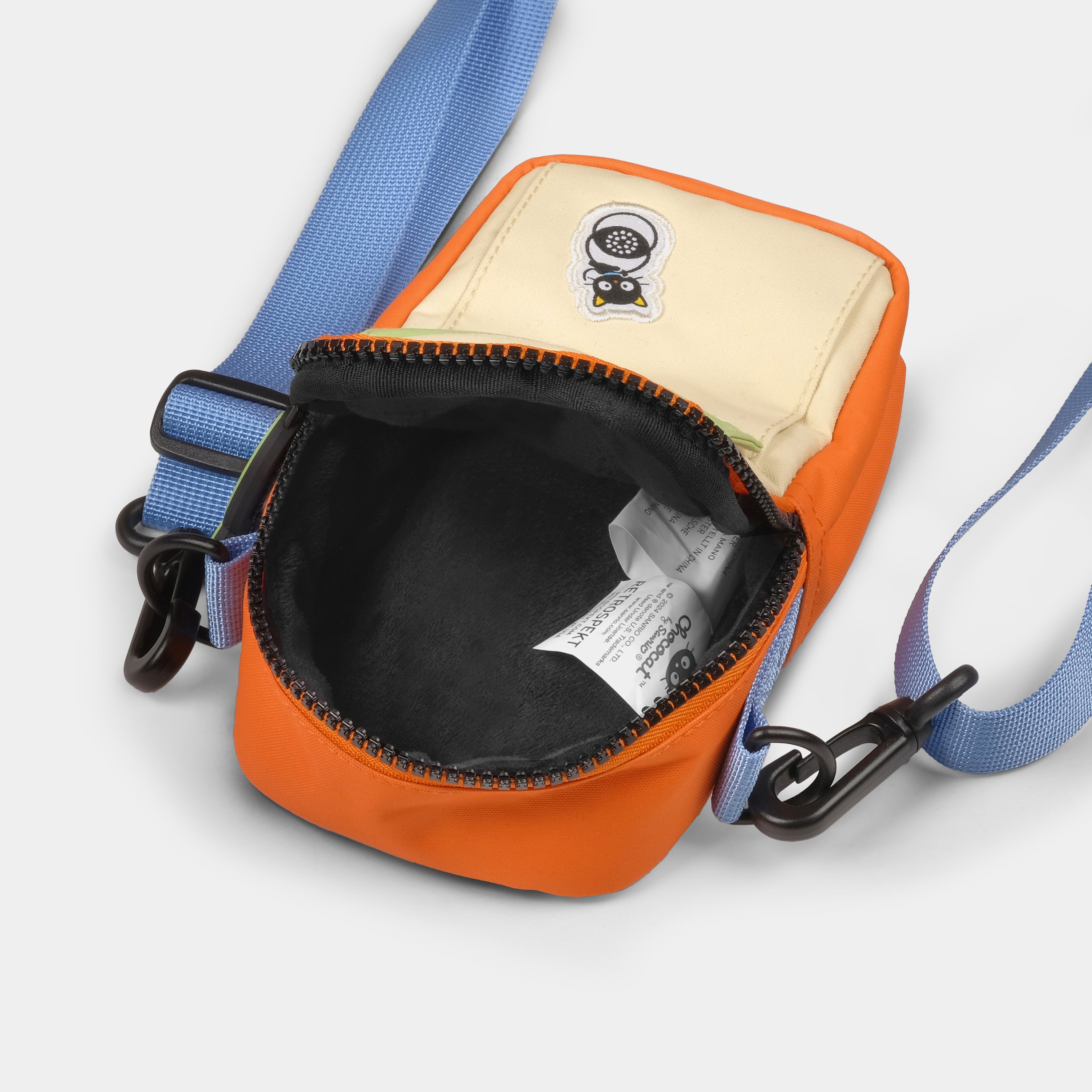 Chococat camera bag showcasing vibrant colors and logo, perfect for film photography.