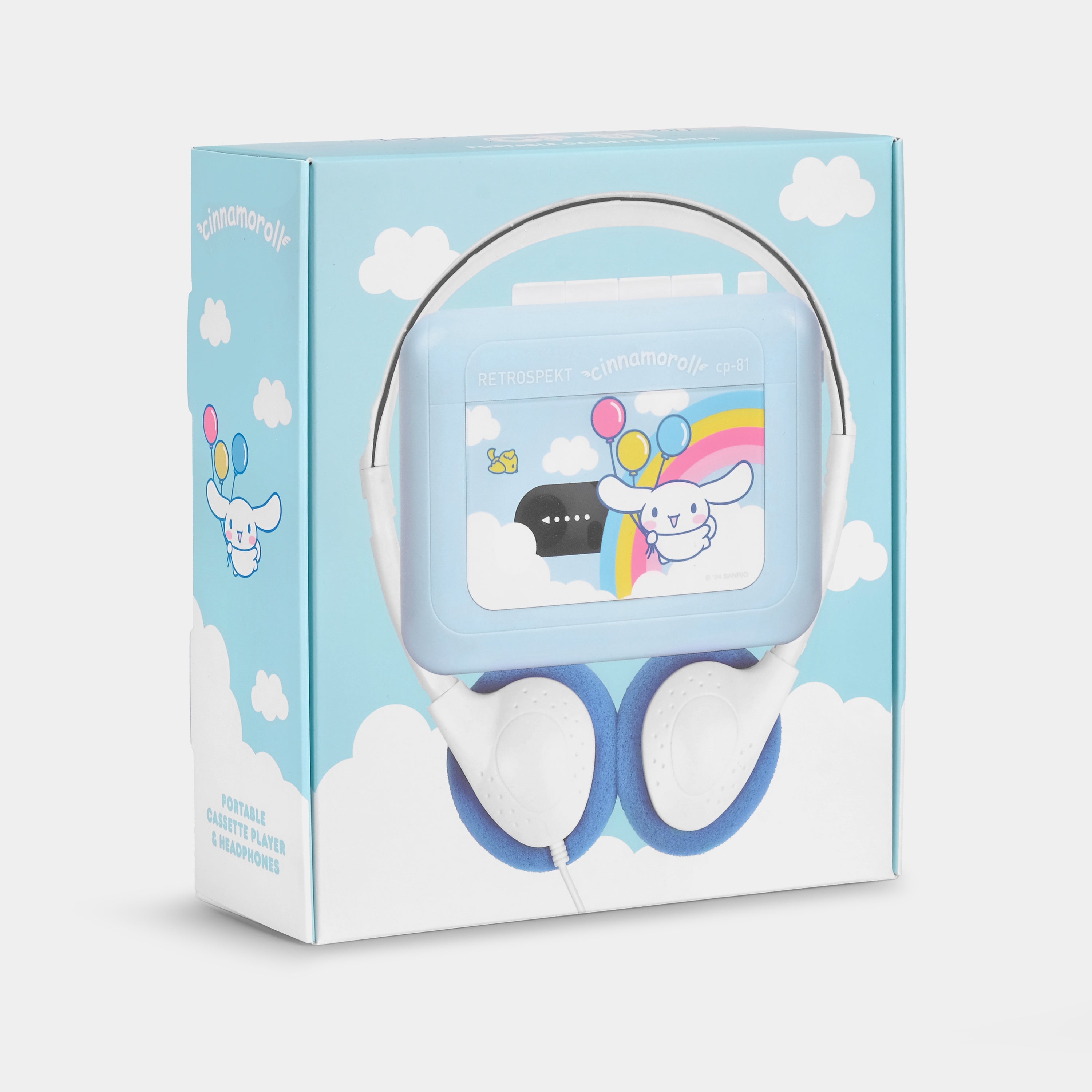 Cinnamoroll CP-81 cassette player in use with retro headphones on a wooden table