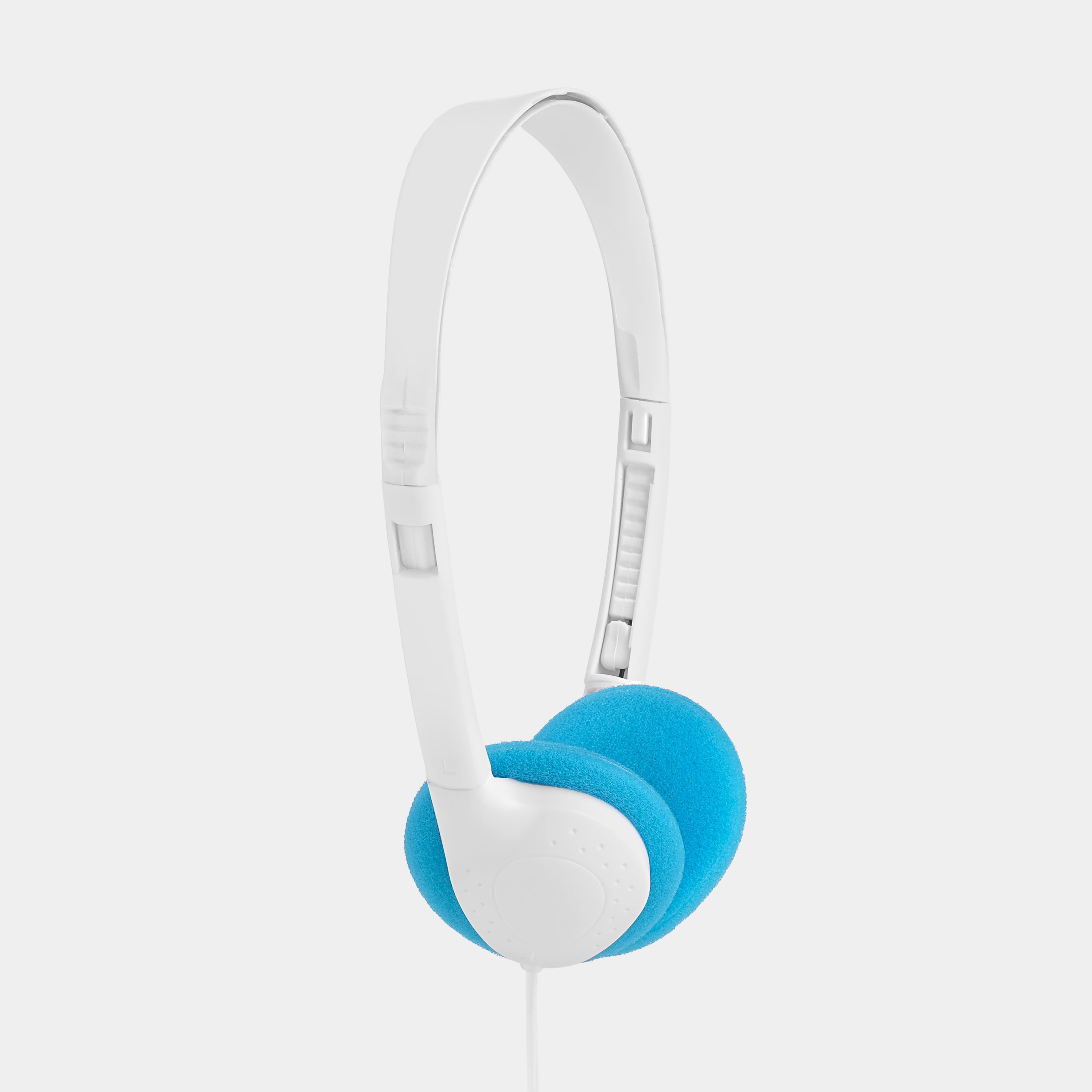 Cinnamoroll CP-81 cassette player in use with retro headphones on a wooden table