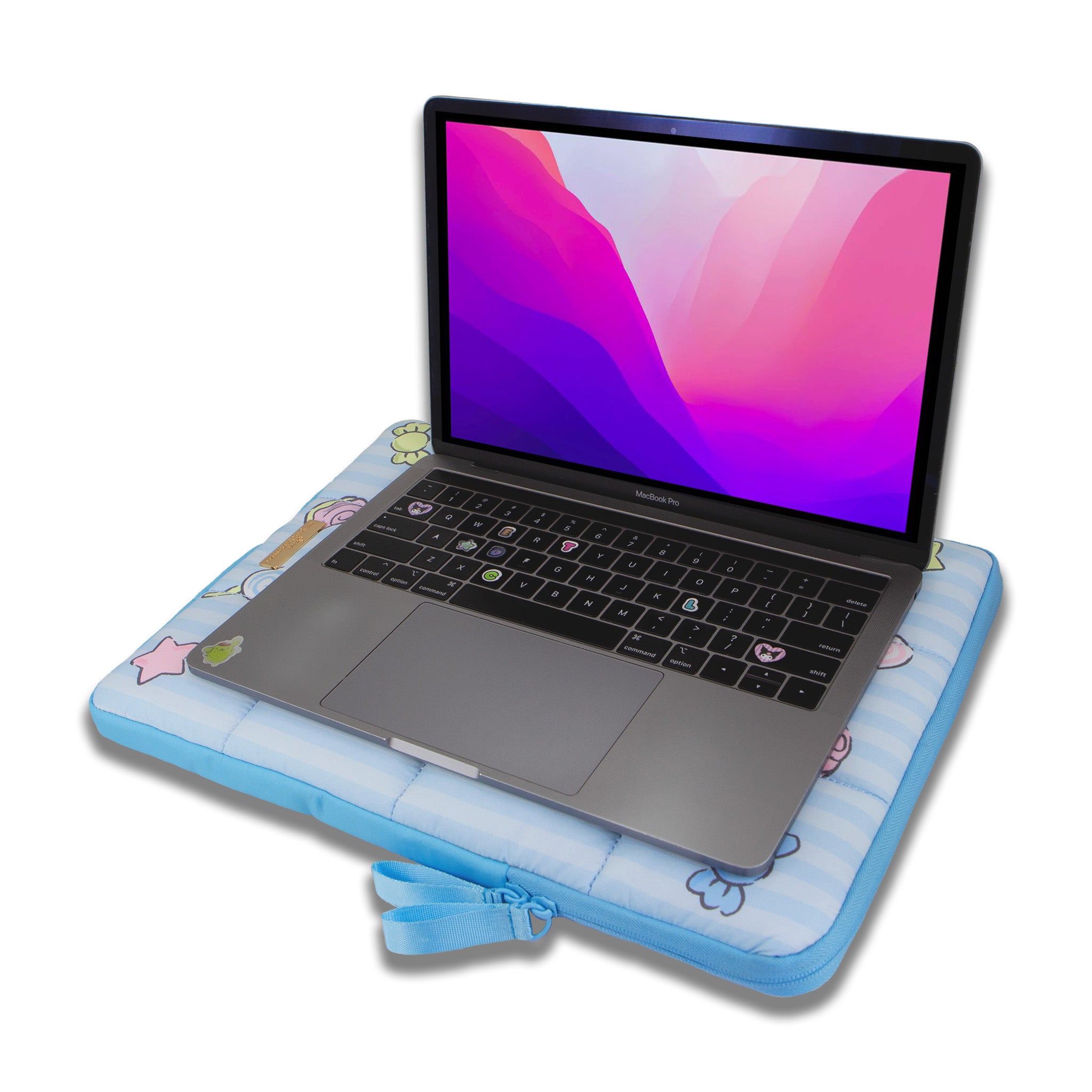 Close-up of Cinnamoroll ribbon design on blue quilted laptop sleeve