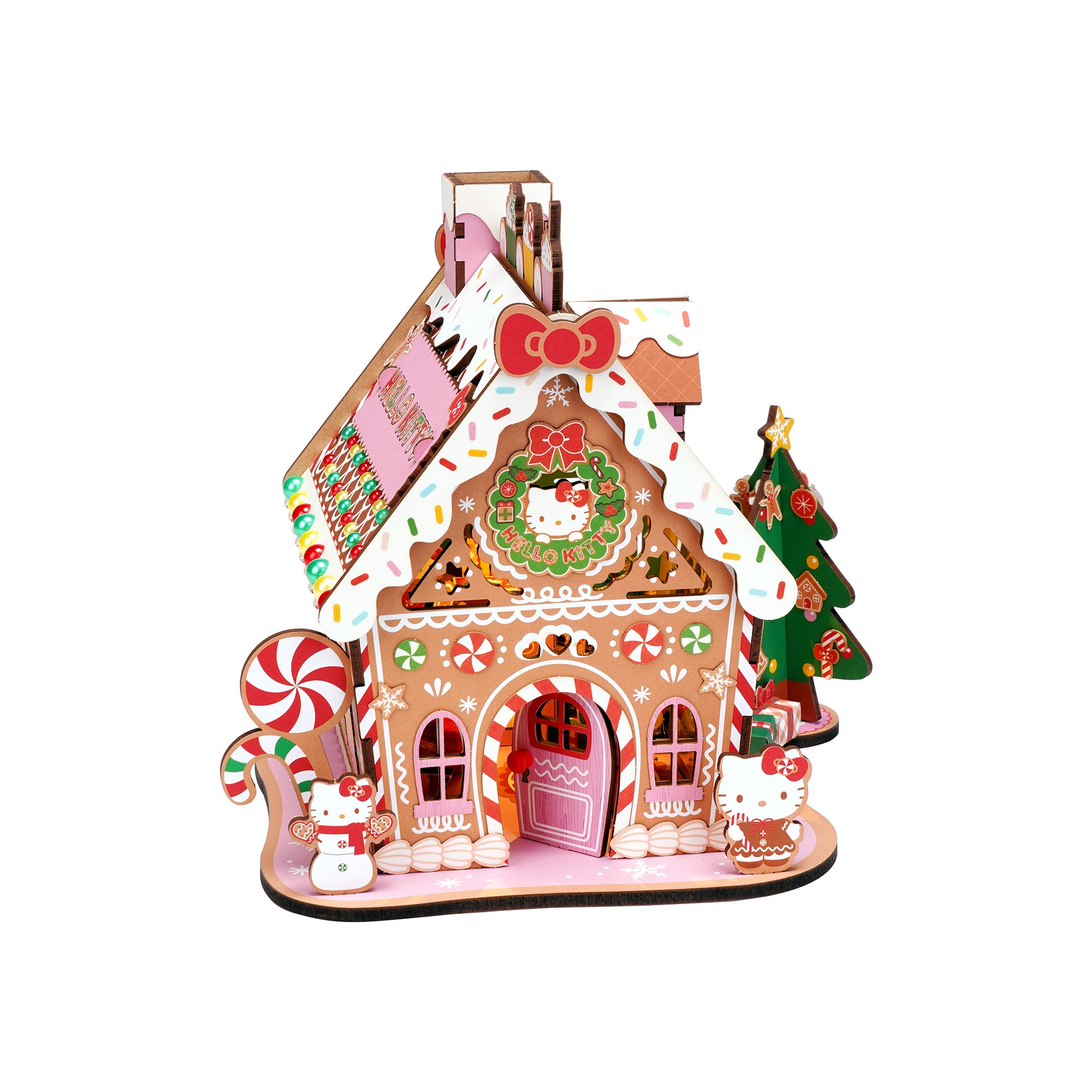 Close-up of the Hello Kitty wooden gingerbread house puzzle pieces and completed structure