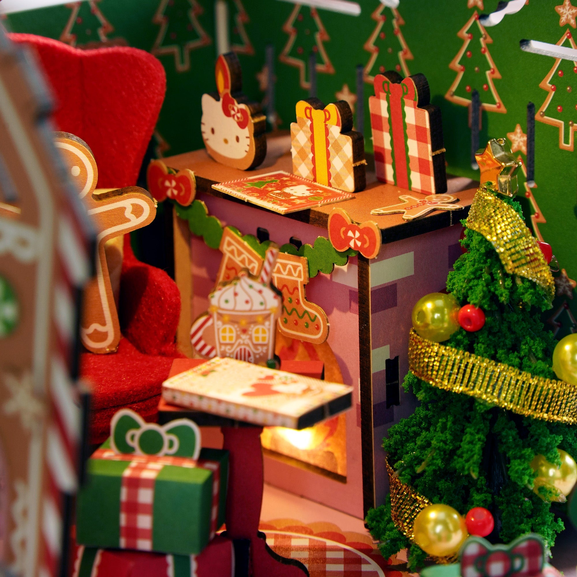Decorated wooden gingerbread house with Hello Kitty design on a festive table