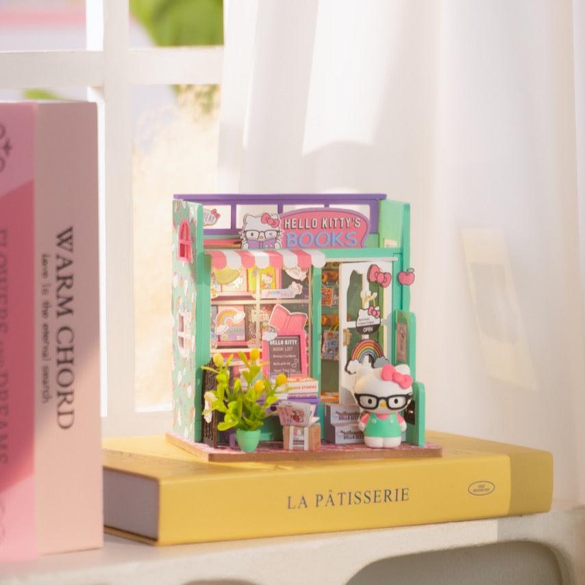 Hello Kitty Miniature Bookstore DIY kit with LED lighting and figurine.