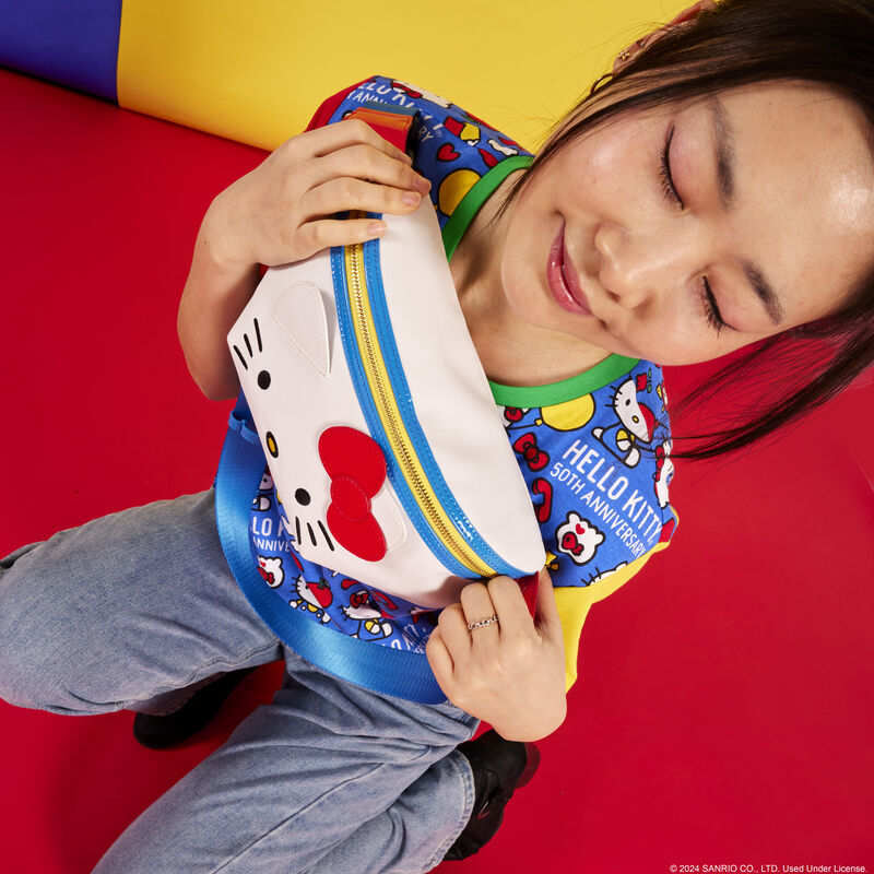 Loungefly Hello Kitty bag worn around the waist, showcasing its stylish design