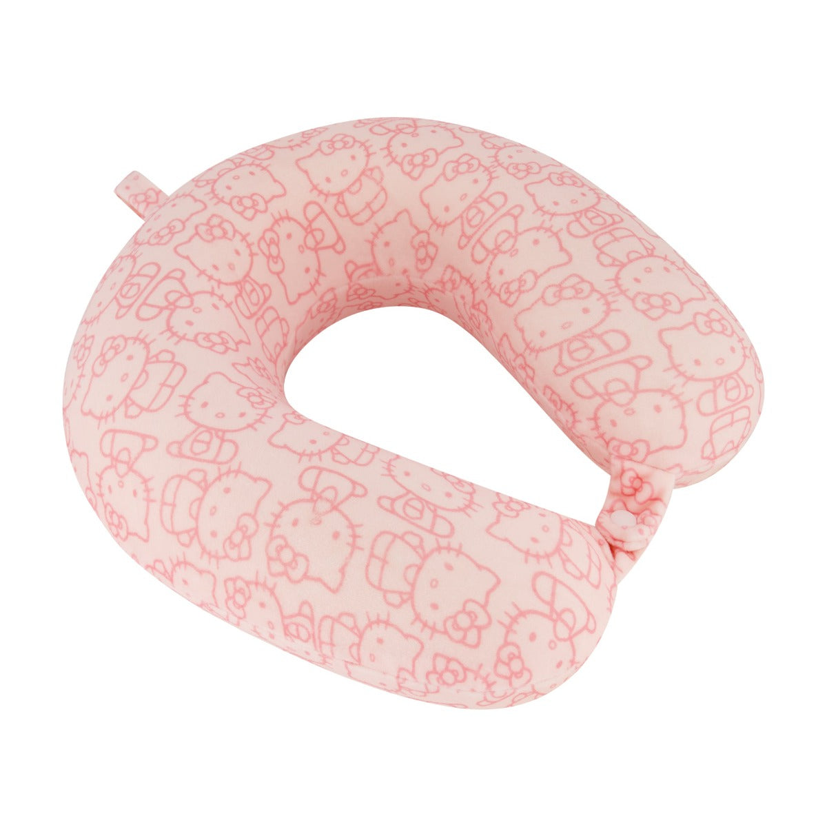 Close-up of memory foam Hello Kitty neck pillow resting on airplane seat