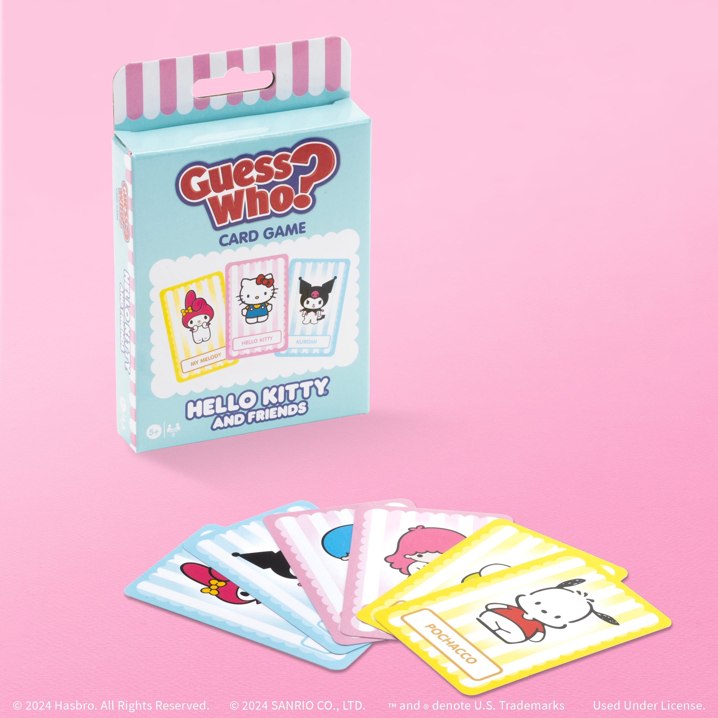 Family playing the Hello Kitty card game together at home