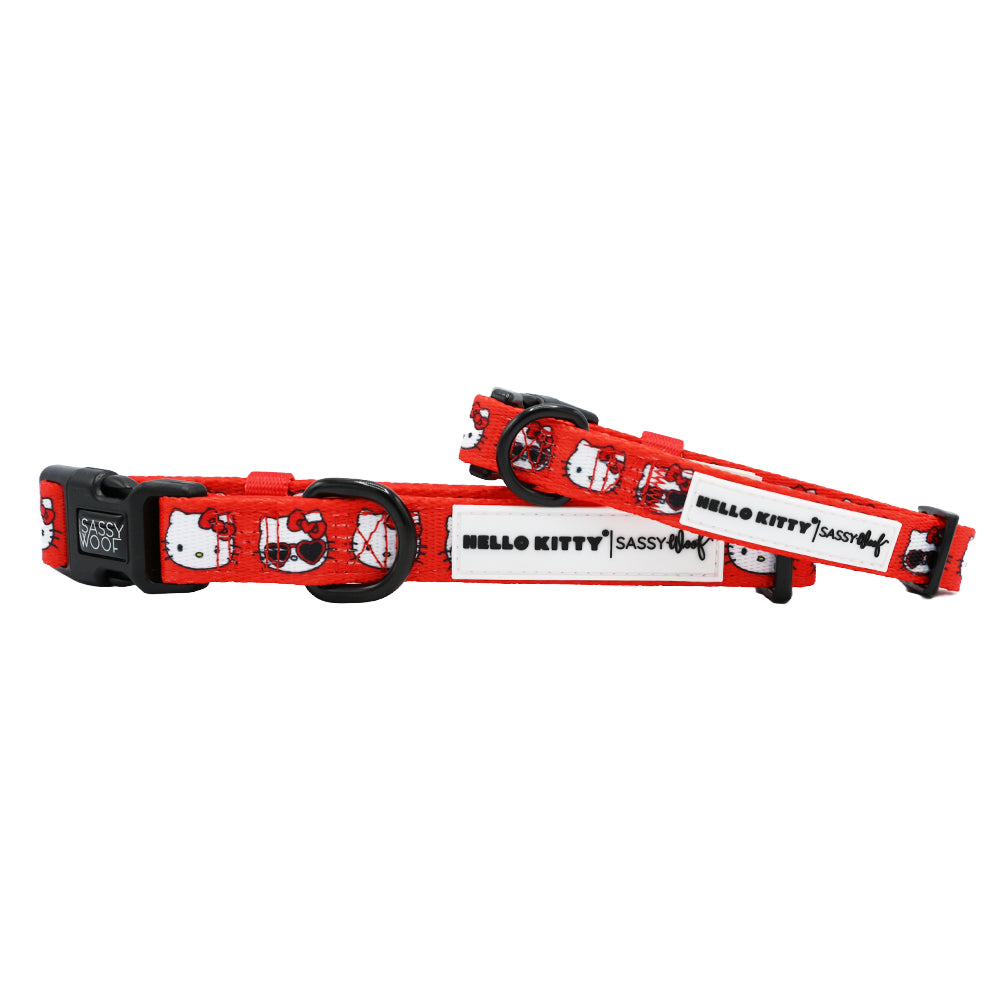 Close-up of the Hello Kitty red leather dog collar highlighting the playful design.
