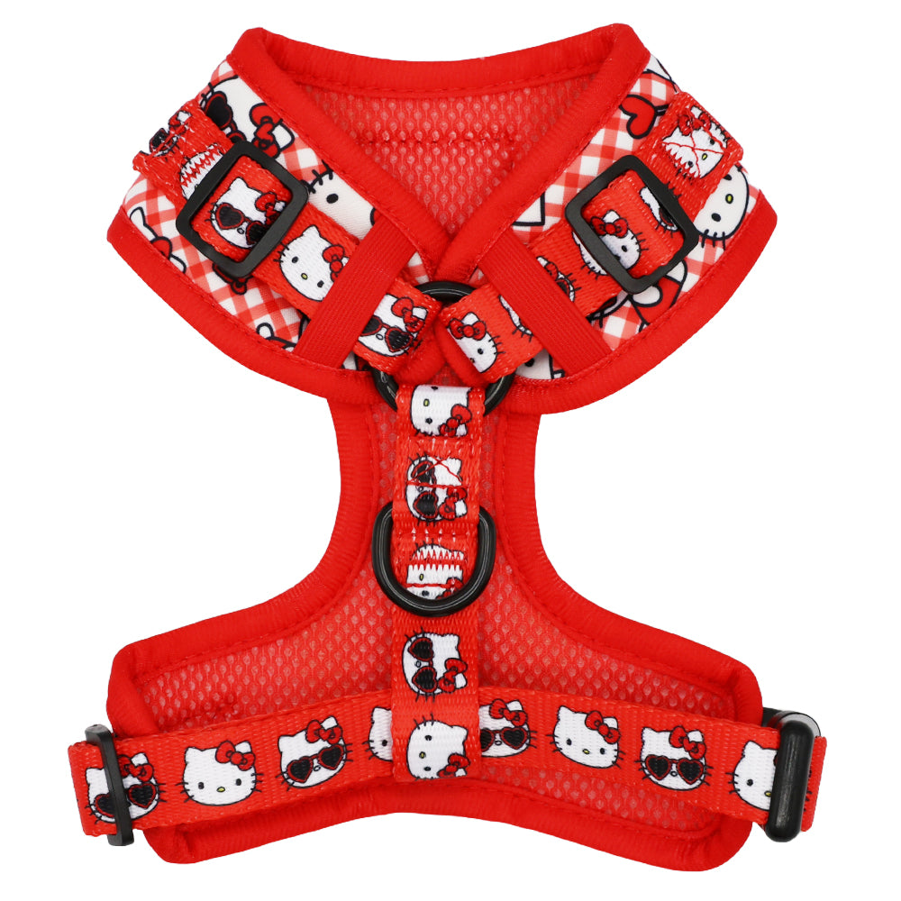 Close-up of the adjustable straps and D-rings on the red Hello Kitty dog harness.
