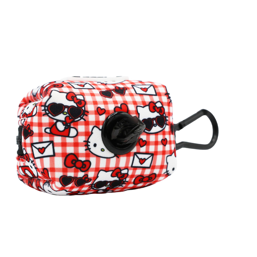 Close-up of the zipper pull on the Hello Kitty waste bag dispenser, showcasing its durability.