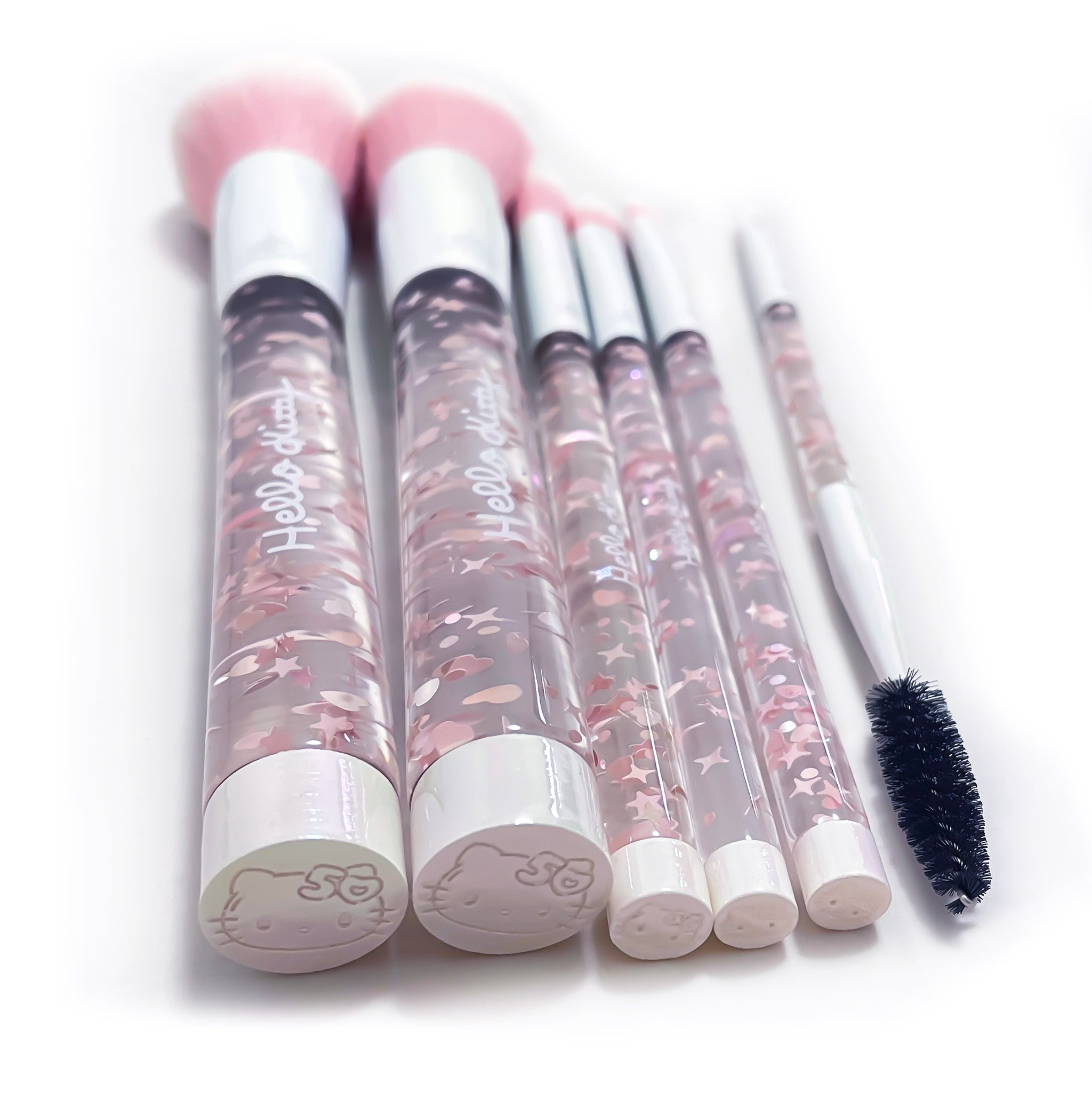 Full view of the 6-piece Hello Kitty makeup brush set on a vanity.