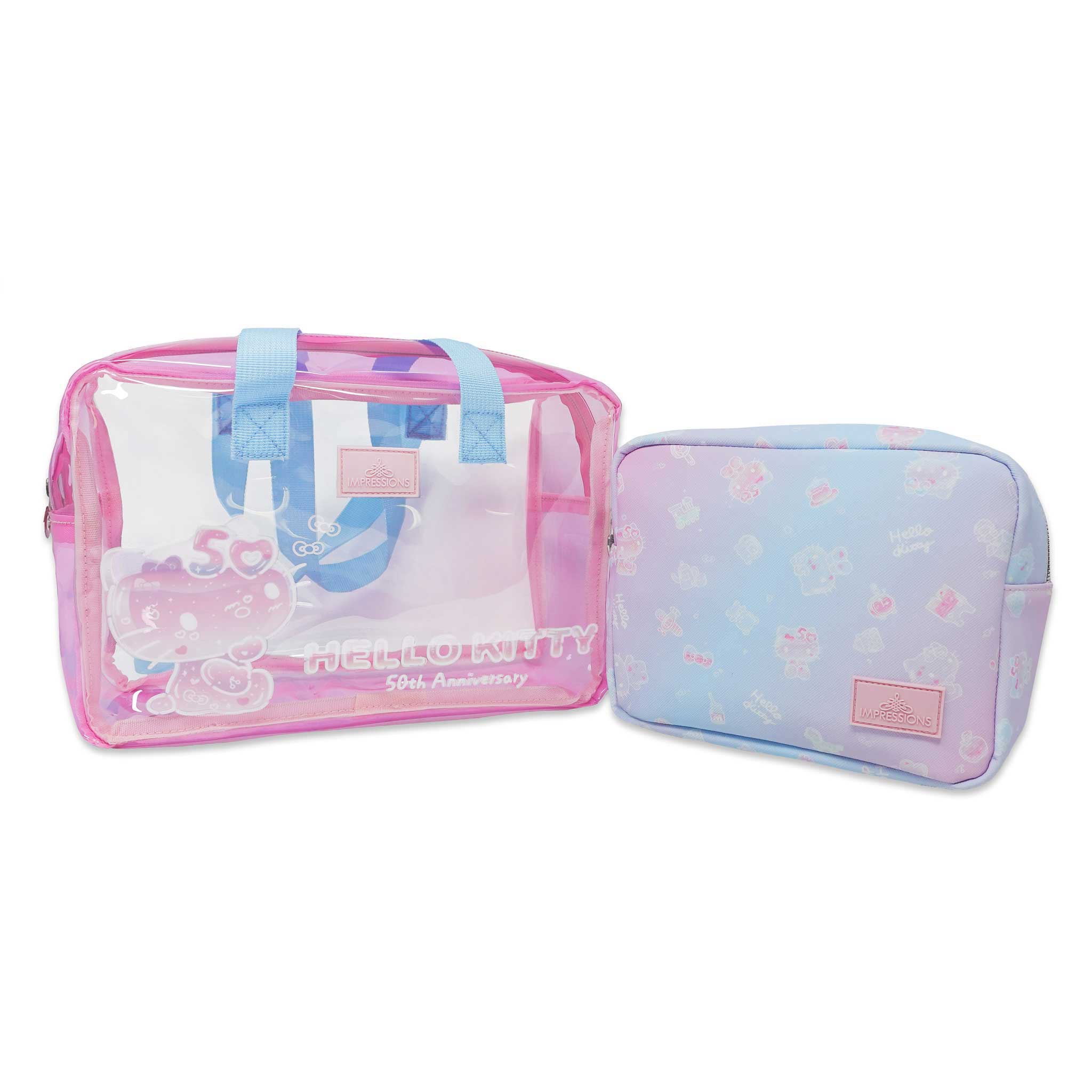 Hello Kitty 50th Anniversary travel makeup clutch set open, showing clear and pastel pouches