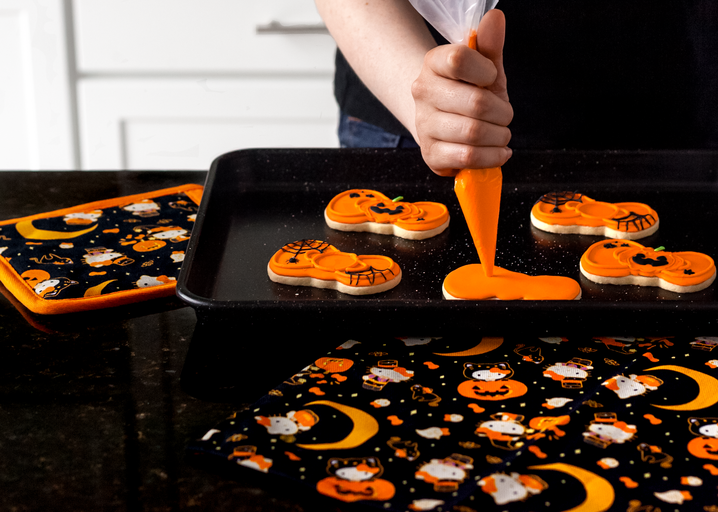 Full baking set displayed on a rustic kitchen counter with autumn decor