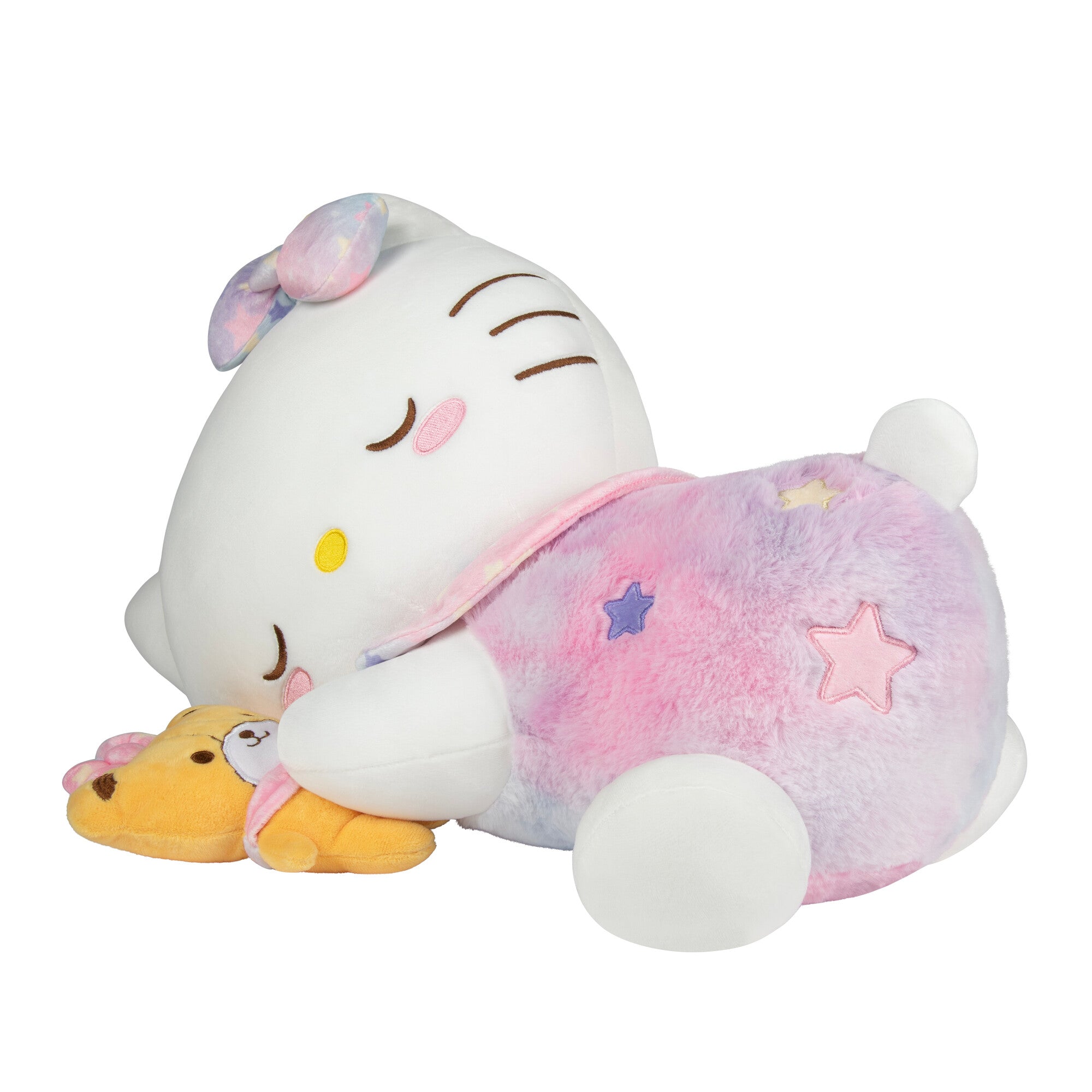 Hello Kitty plush lounging in a cozy bedroom setting