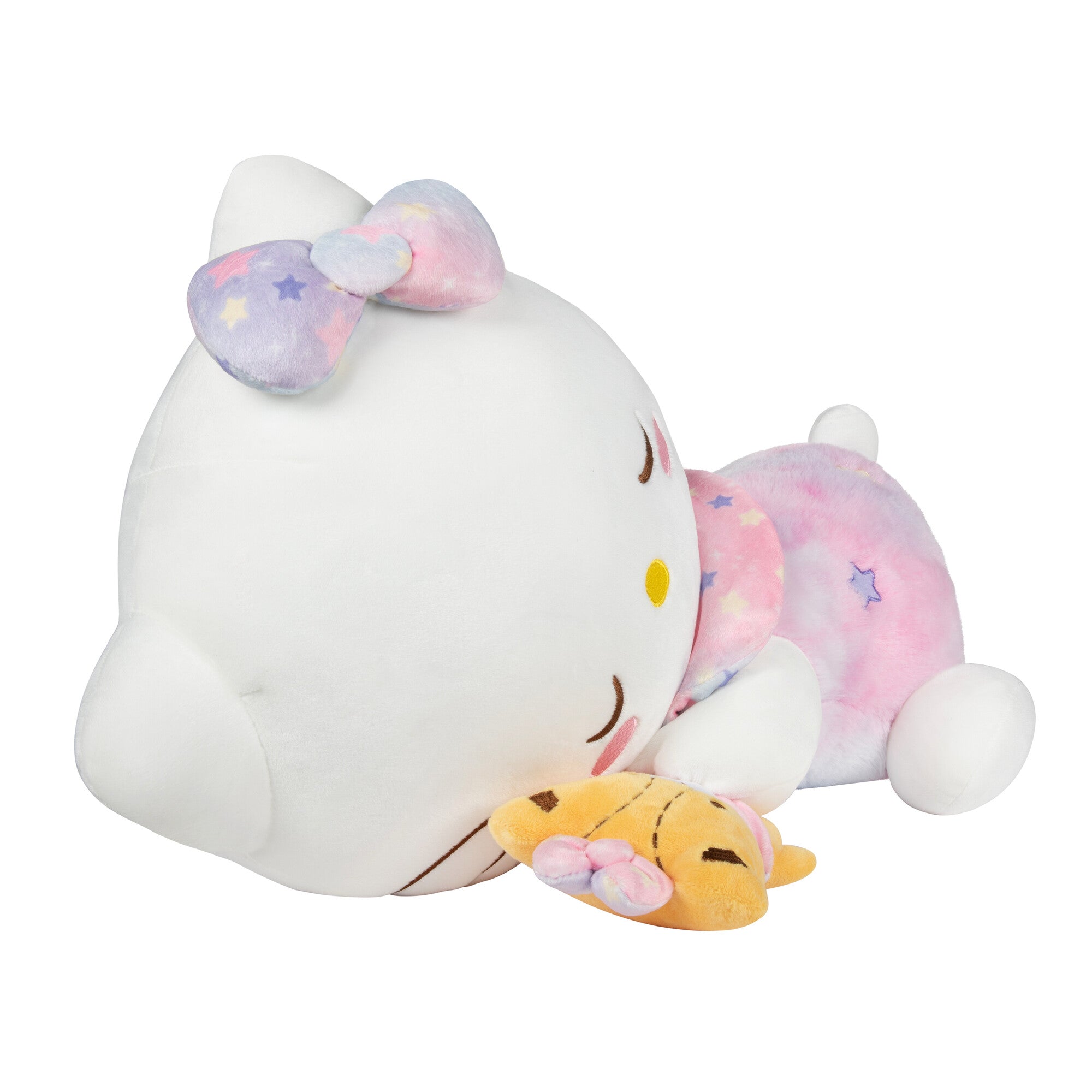 Close-up of embroidered details and Tiny Chum plush accessory