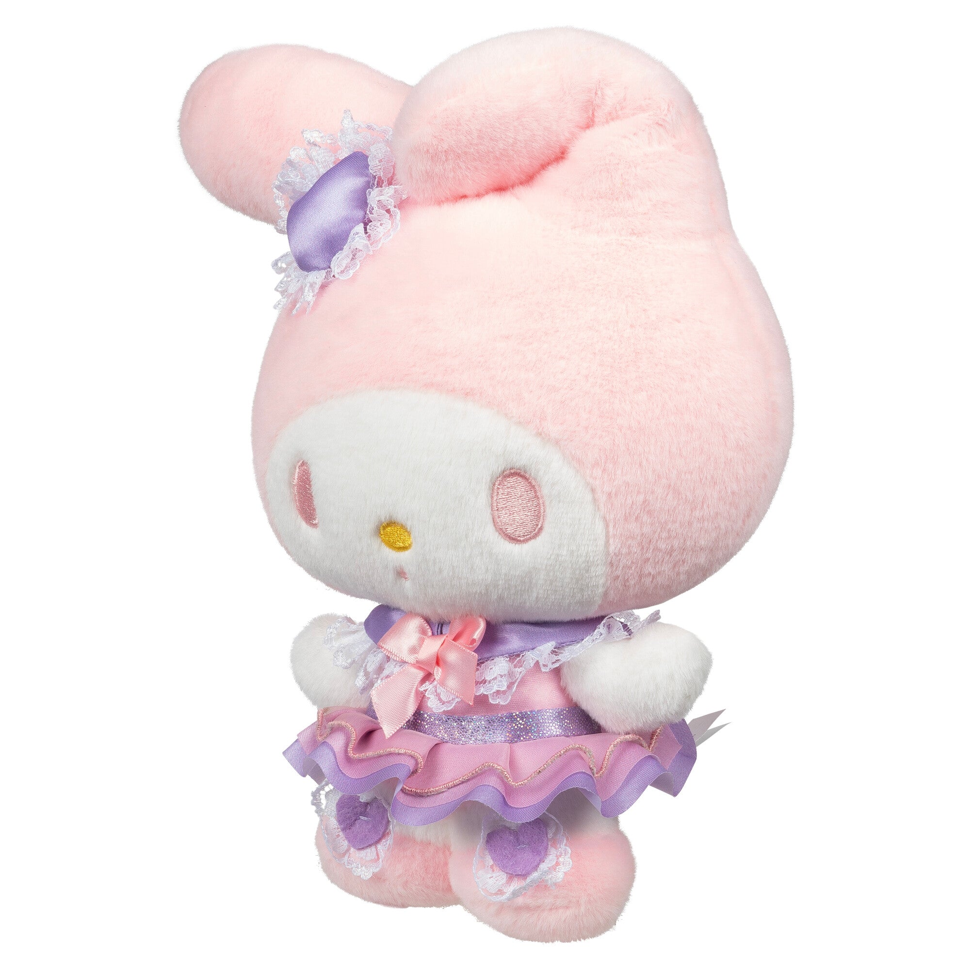 Giant My Melody plush showcased in a cozy bedroom setting.