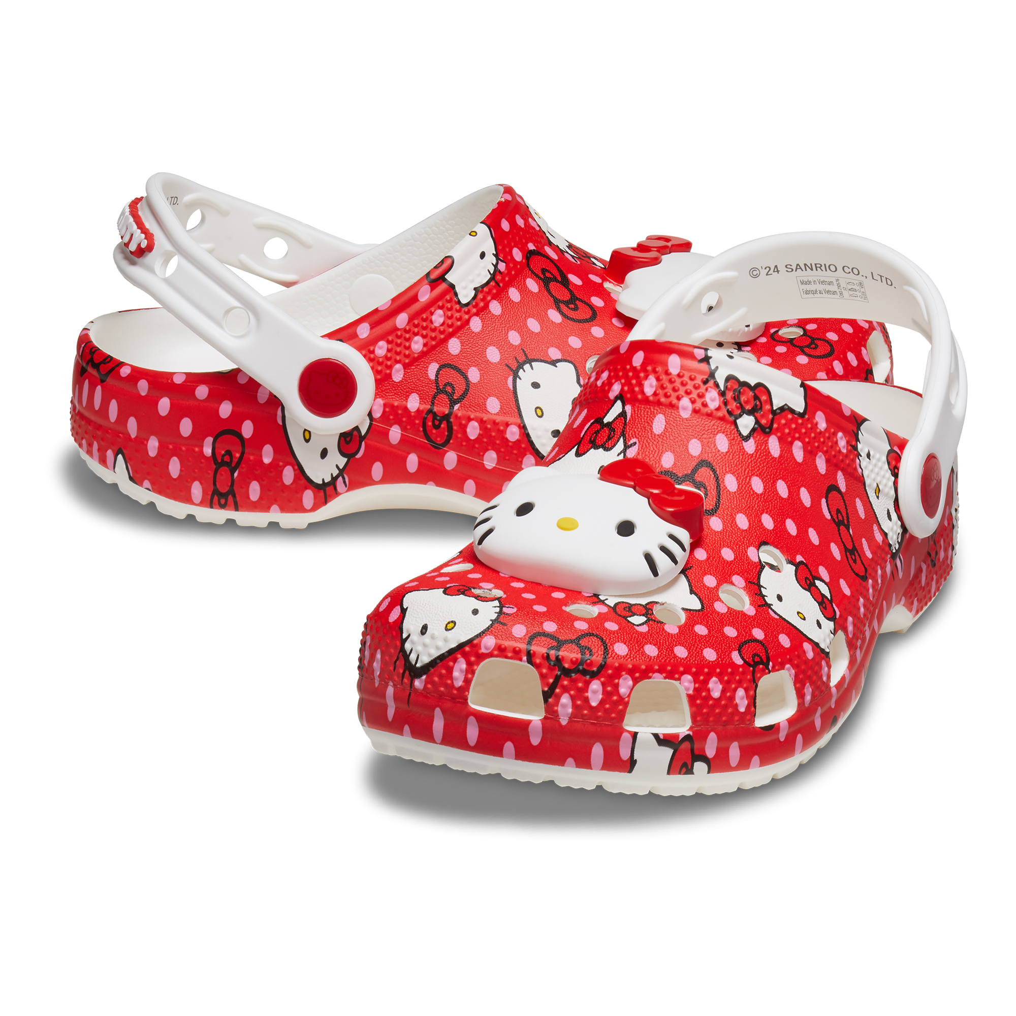 Front view of Hello Kitty toddler clogs with polka-dot pattern and ventilation ports Front view of Hello Kitty toddler clogs with polka-dot pattern and ventilation ports
