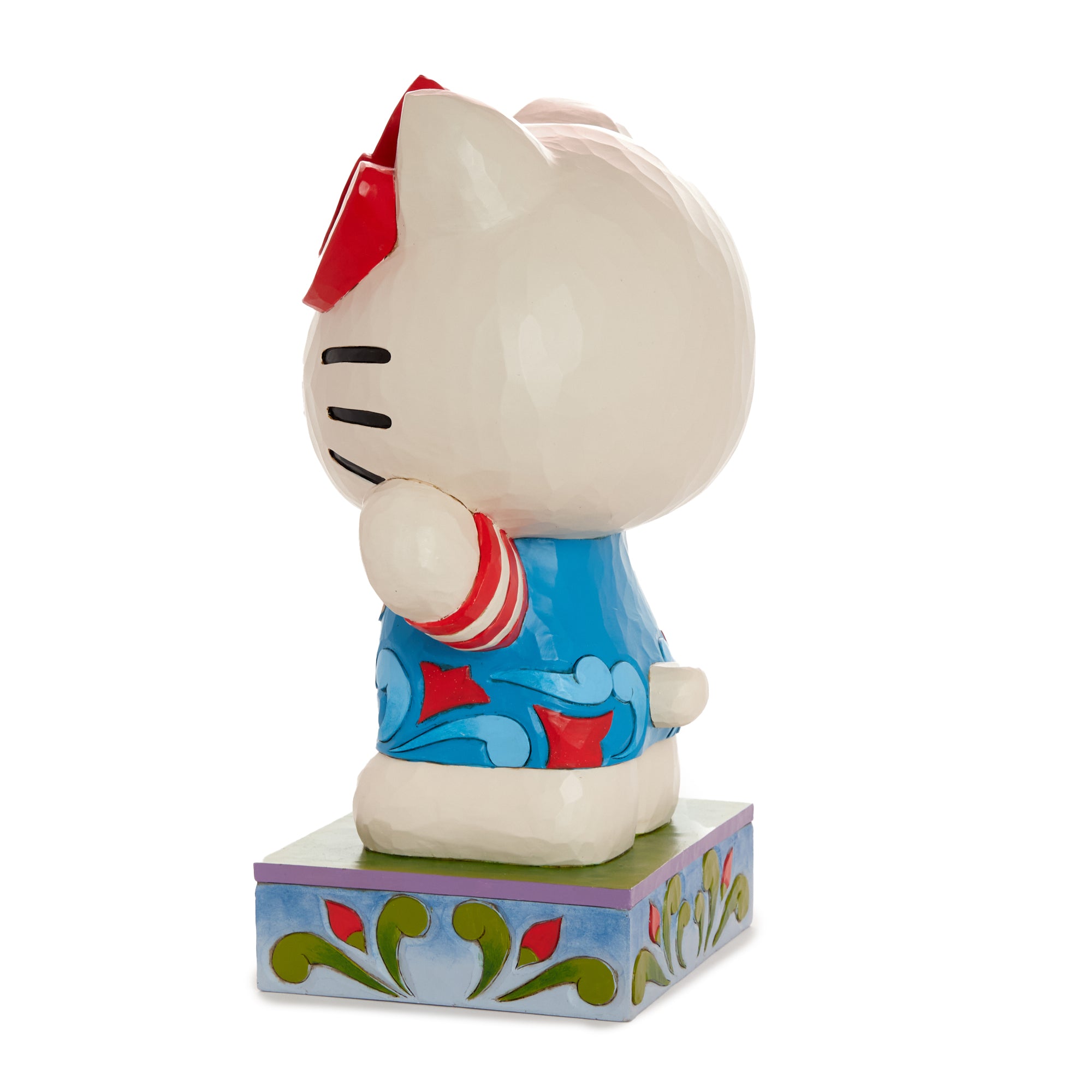 Hello Kitty figurine by Jim Shore, vibrant colors and intricate patterns.