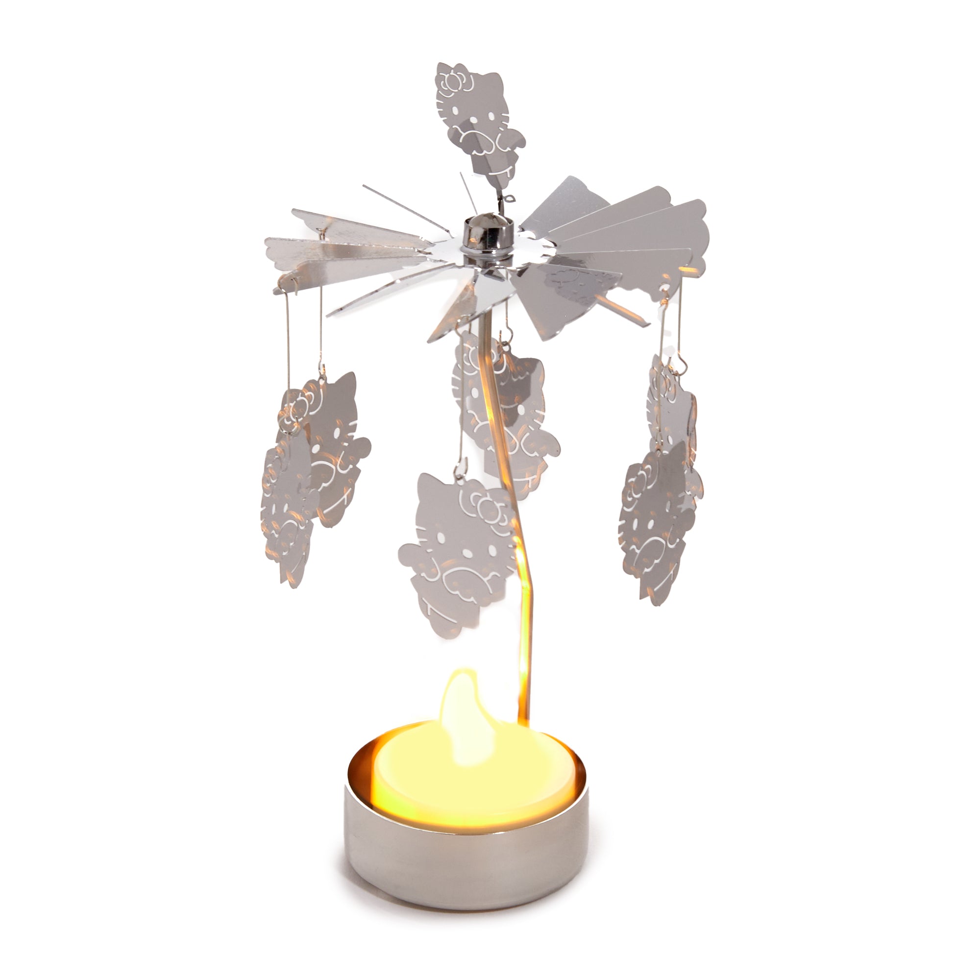 Close-up of german candle carousel detail showing angel charms mid-rotation