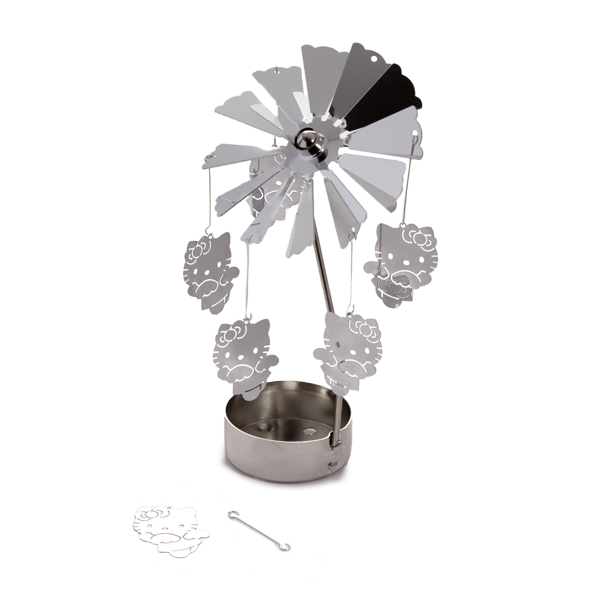Decorative xmas candle carousel styled with holly and vintage nativity scene