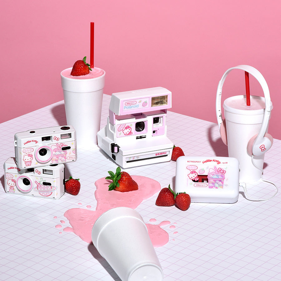 Side angle of the Hello Kitty camera showing the wrist strap