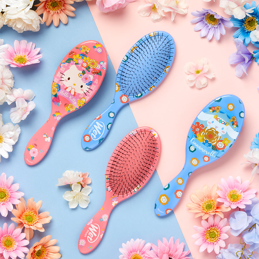 Close-up of IntelliFlex bristles on Hello Kitty detangler brush showcasing flexibility