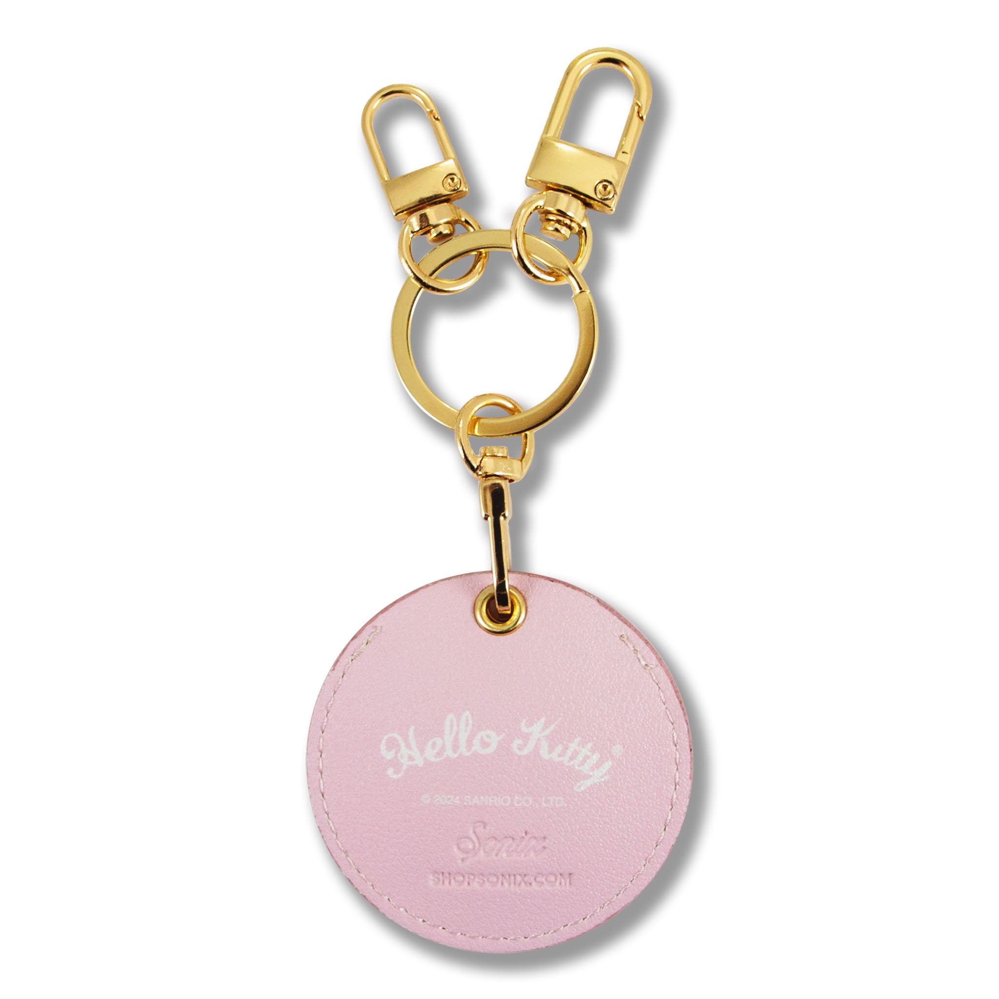 Sonix AirTag in leather holder displayed with Stanley cup accessories Hello Kitty edition