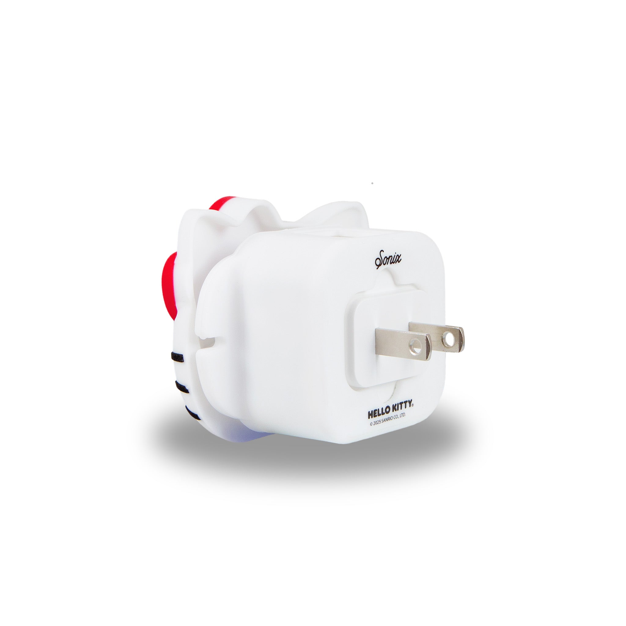 Close-up of the dual USB-A and USB-C ports on the Hello Kitty wall charger.