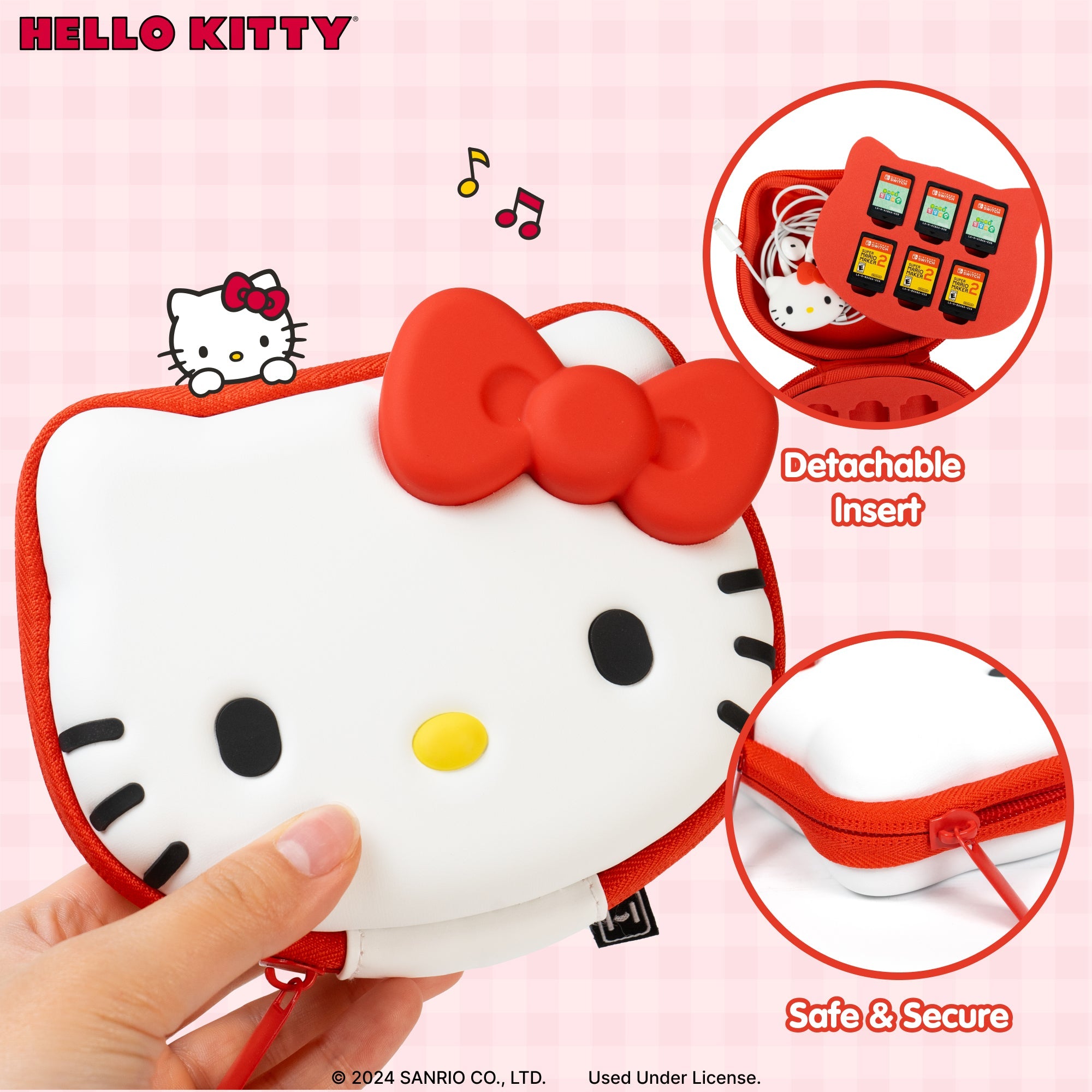 Open Hello Kitty case showing slots for Nintendo Switch games.
