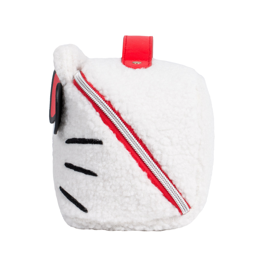 Front view of Hello Kitty makeup bag with embroidered face and leather bow