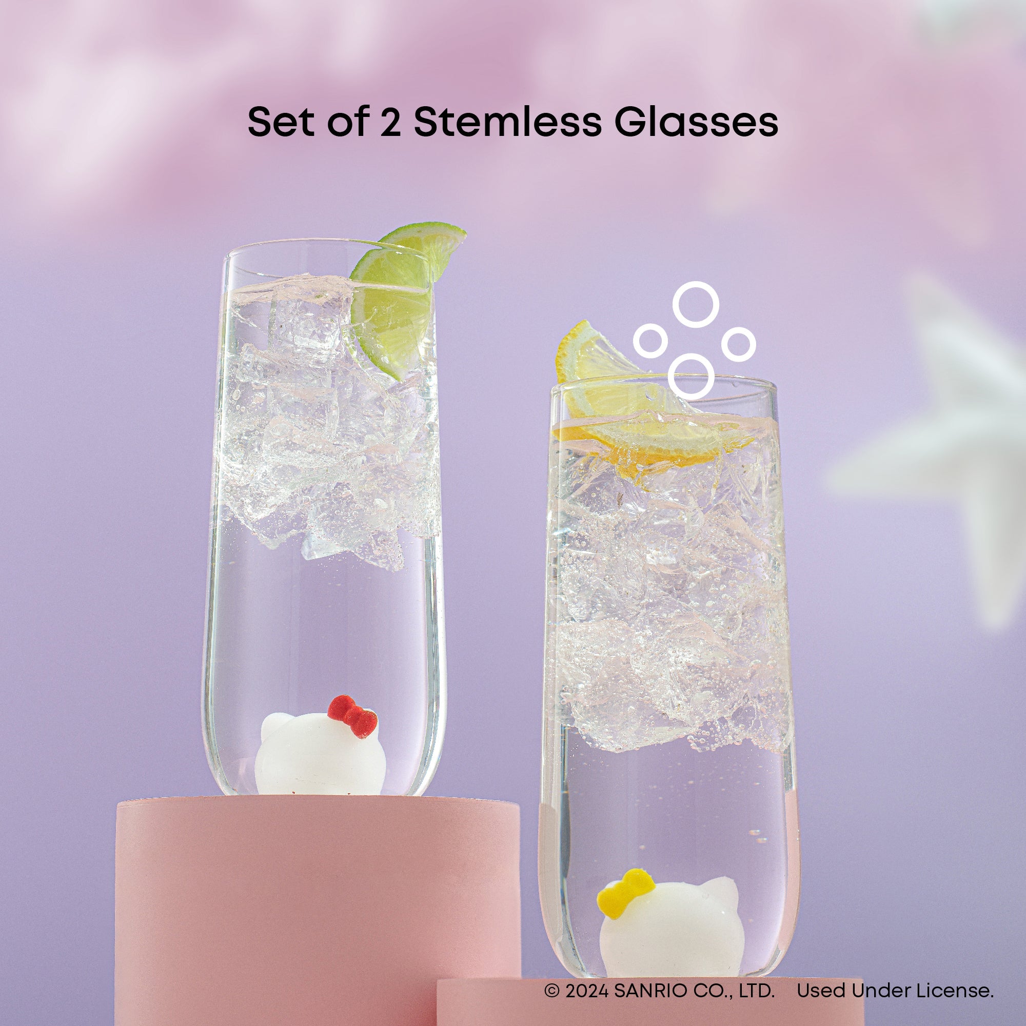 Pair of Hello Kitty & Mimmy borosilicate glass drinking glasses on a table, ready for a toast.