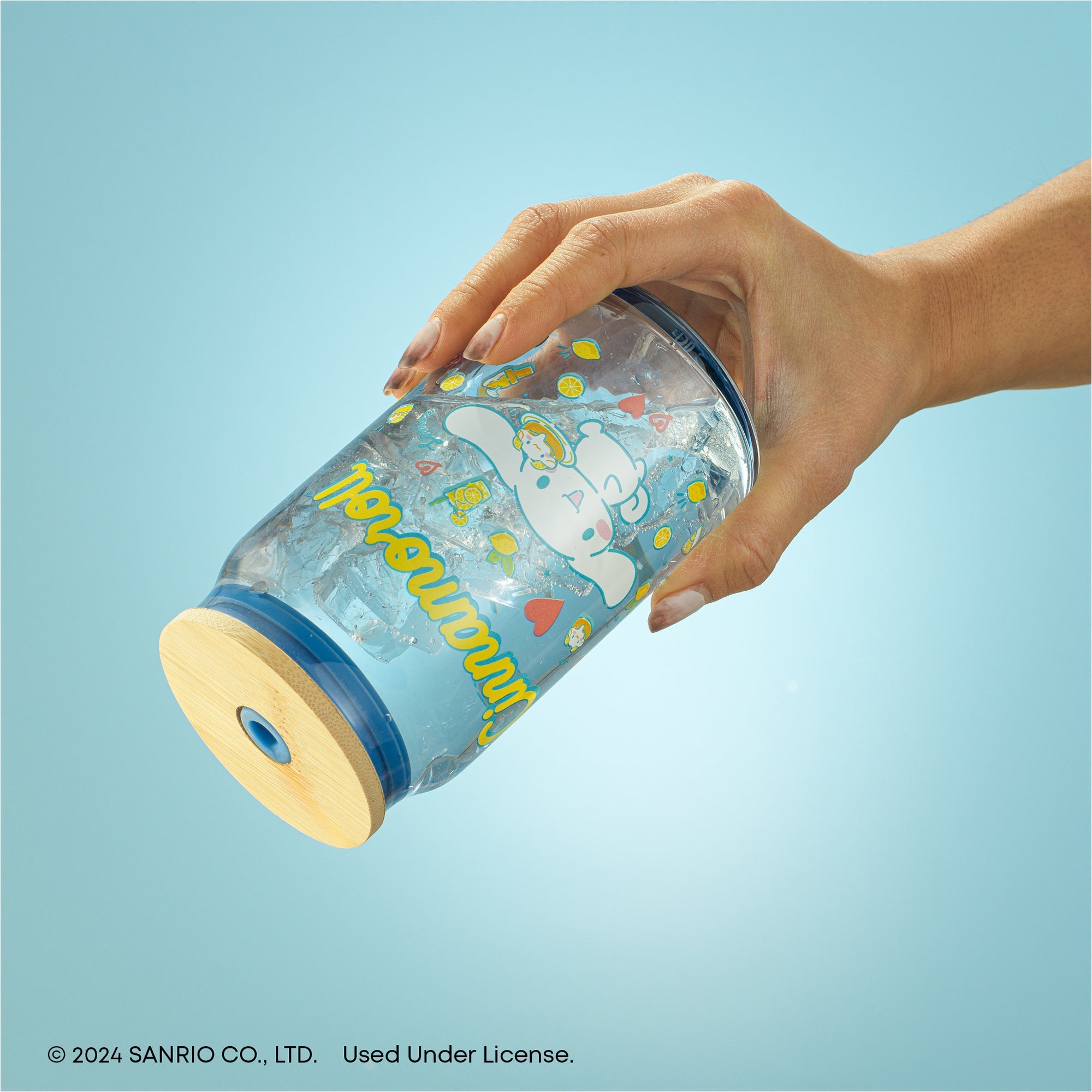 Cinnamoroll glass tumbler with bamboo lid and straw, showcasing its leakproof design