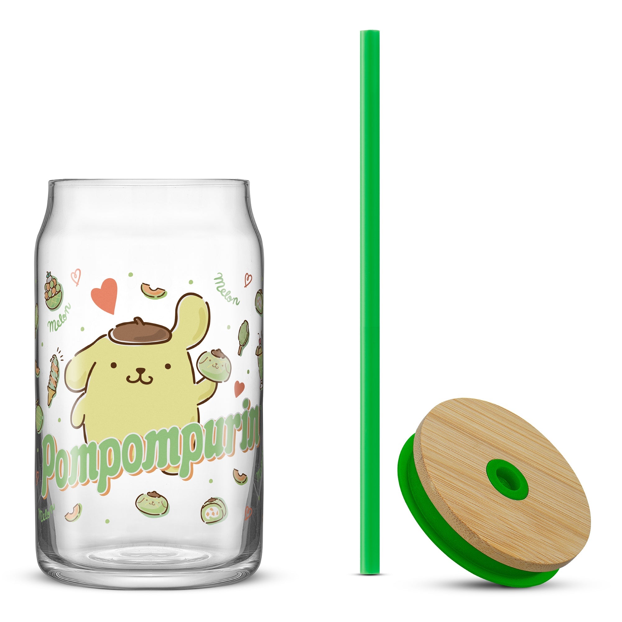Side view of glass tumbler with straw in use at a café table
