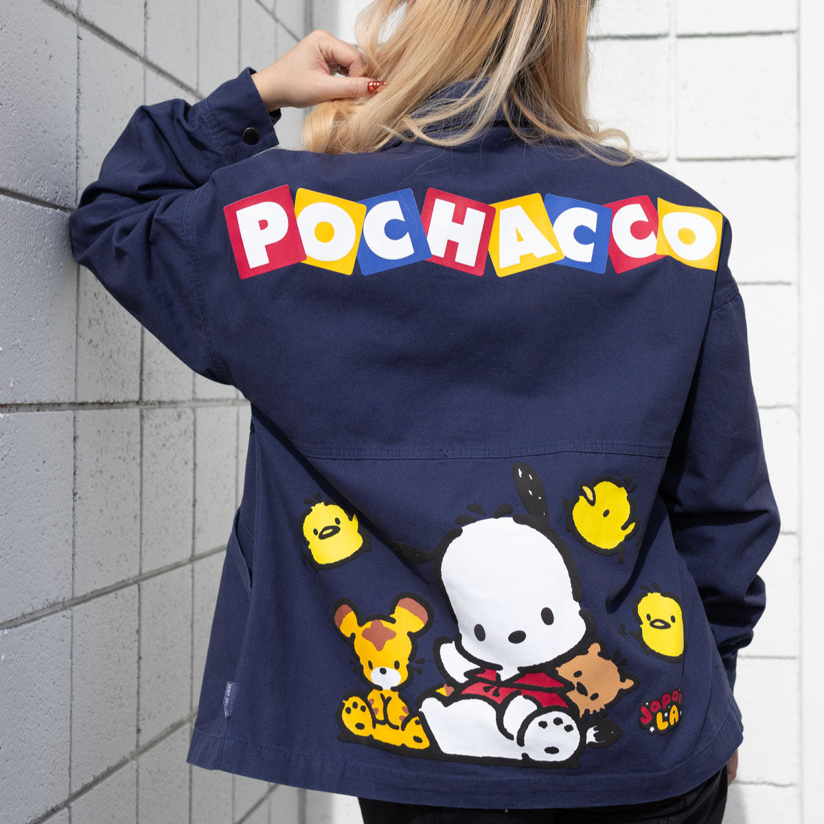 Front view of canvas jacket with Pochacco puff print and zipper closure