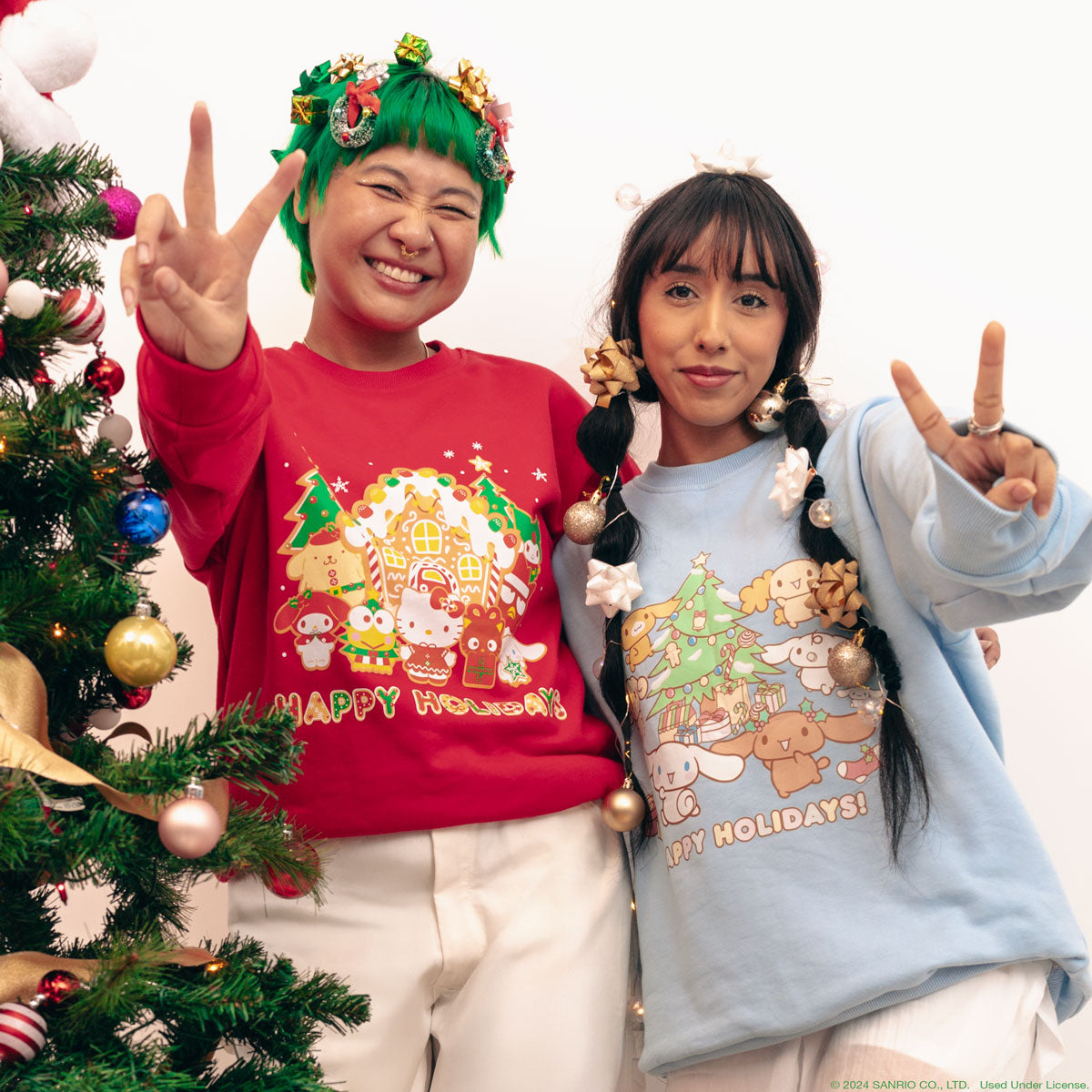 Person wearing the kawaii holiday sweater with sleeves rolled up