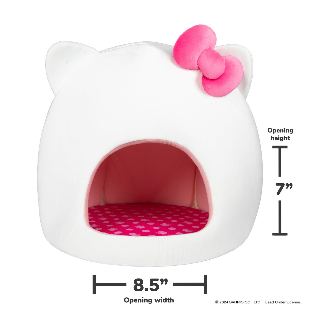 Cozy cat snuggled up inside Hello Kitty covered pet cave bed