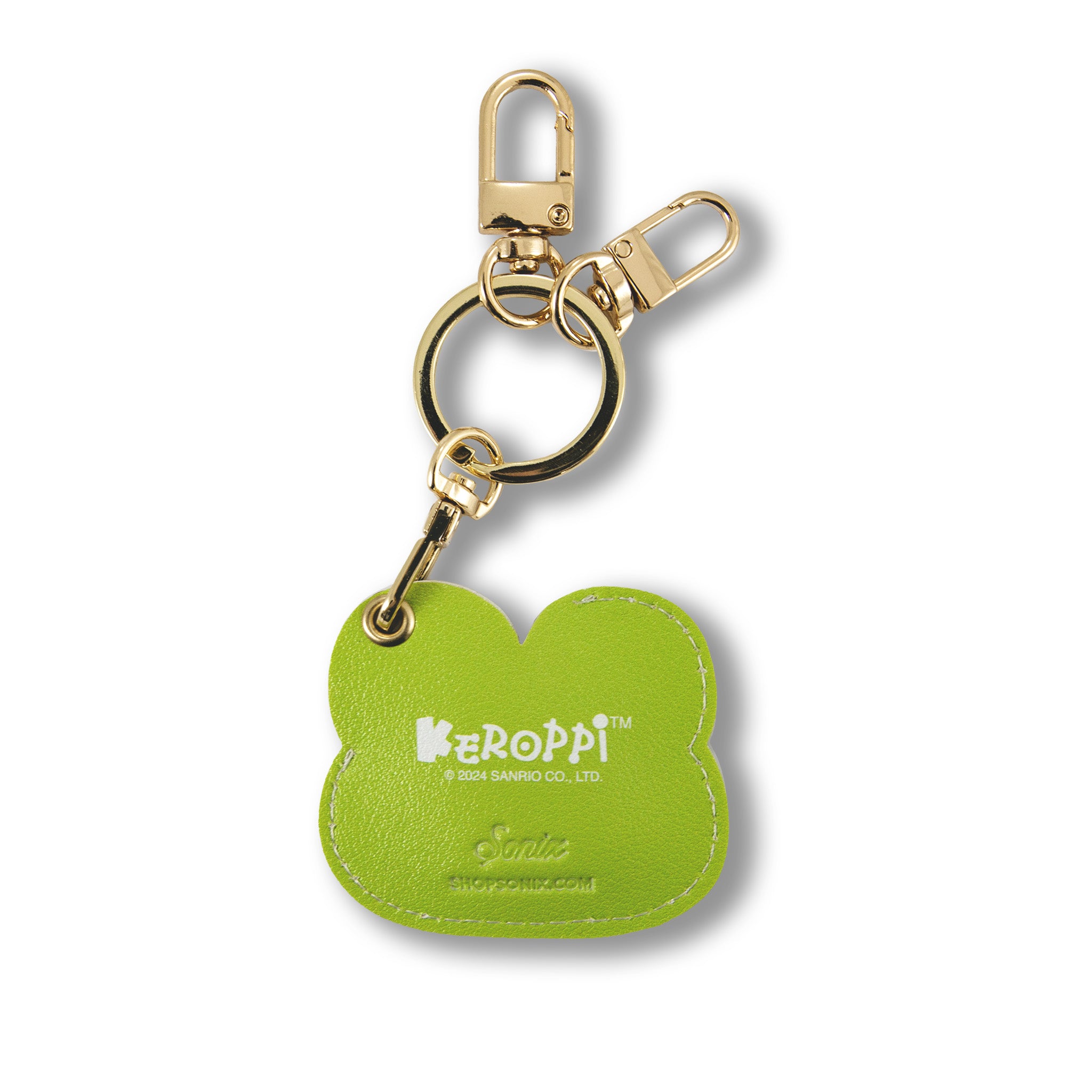 Stylish AirTag case with gold hardware on luggage handle