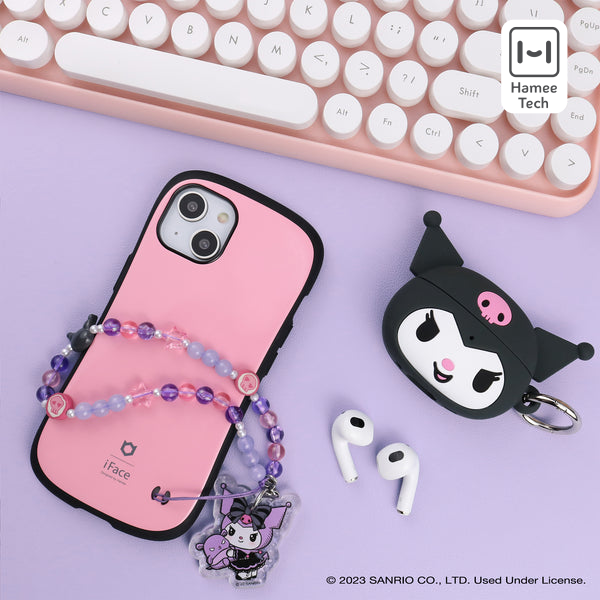 Beaded phone lanyard with Kuromi charm hanging from a smartphone