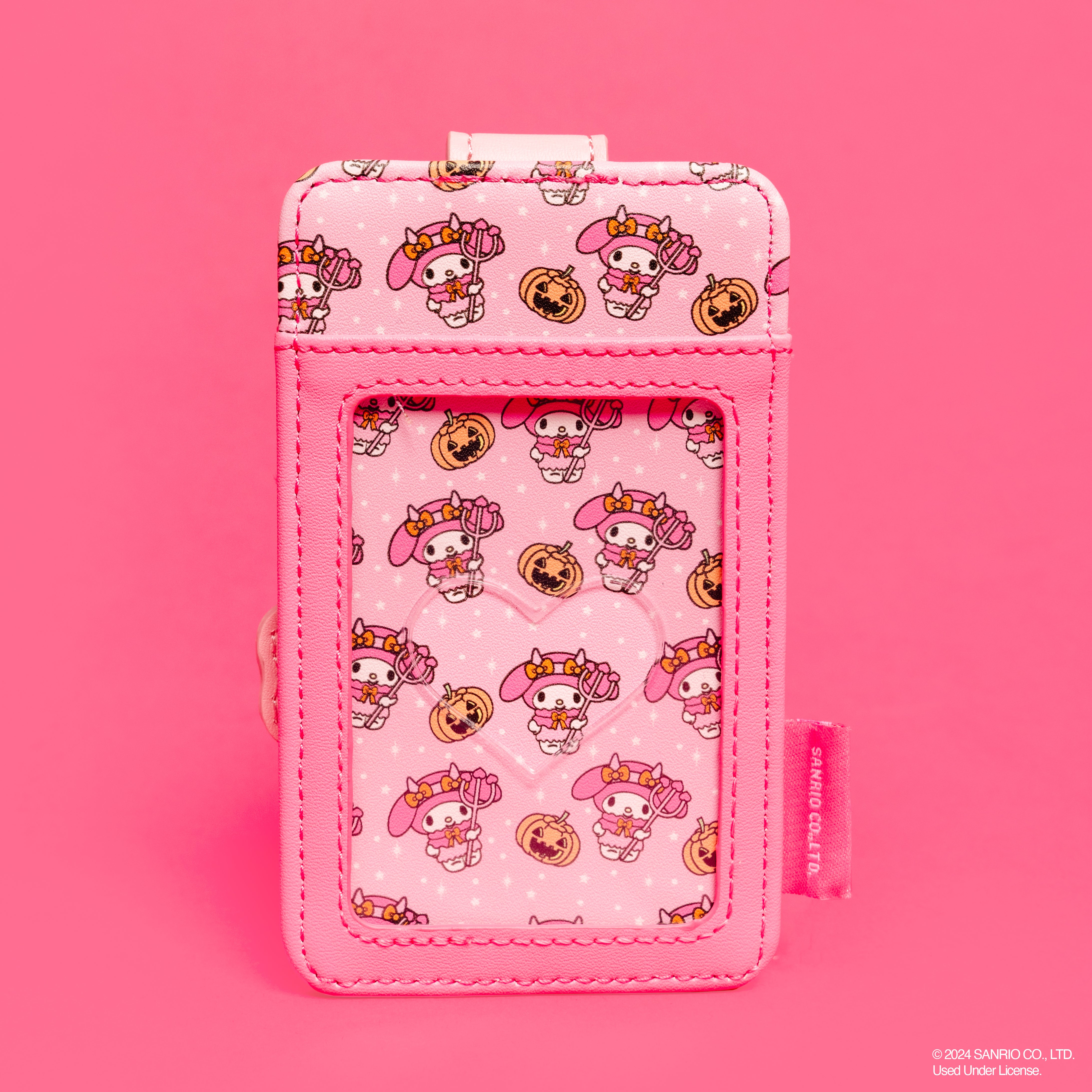 Back view of the My Melody Devil Card Holder, highlighting the coordinating inside lining and gold-colored metal hardware.